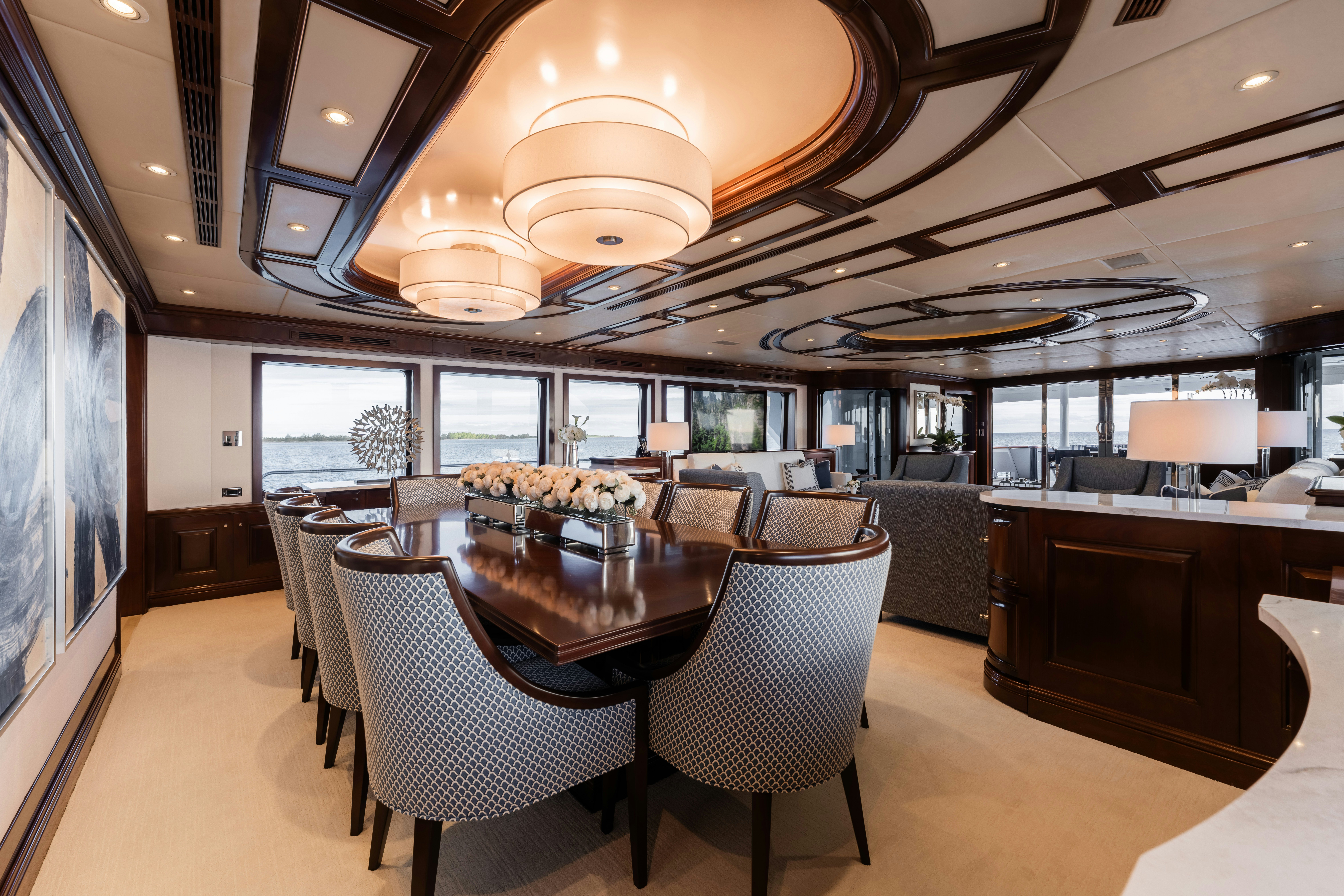 a large room with a table and chairs aboard SUMMERDANCE Yacht for Charter