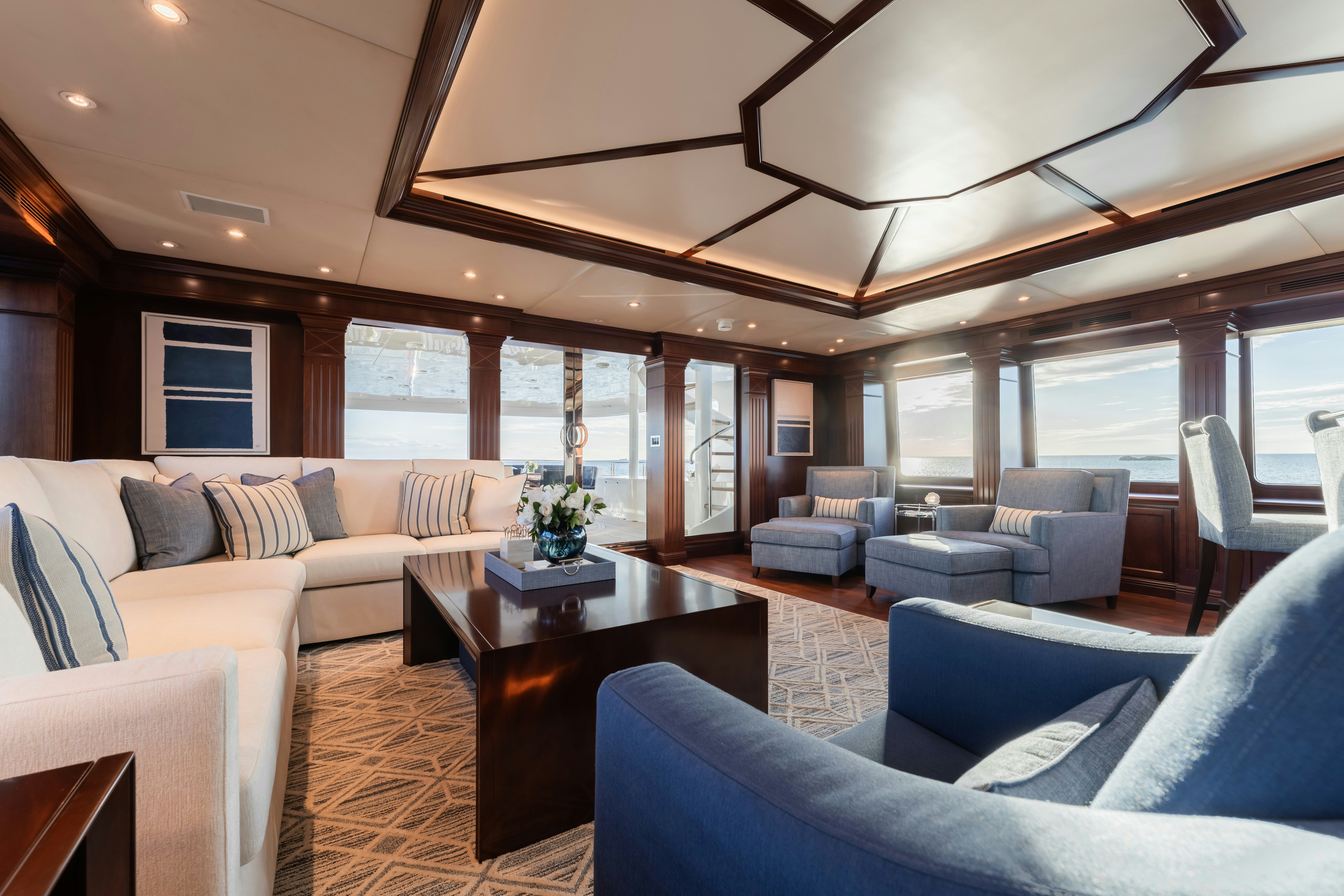 a living room with a large window aboard SUMMERDANCE Yacht for Charter