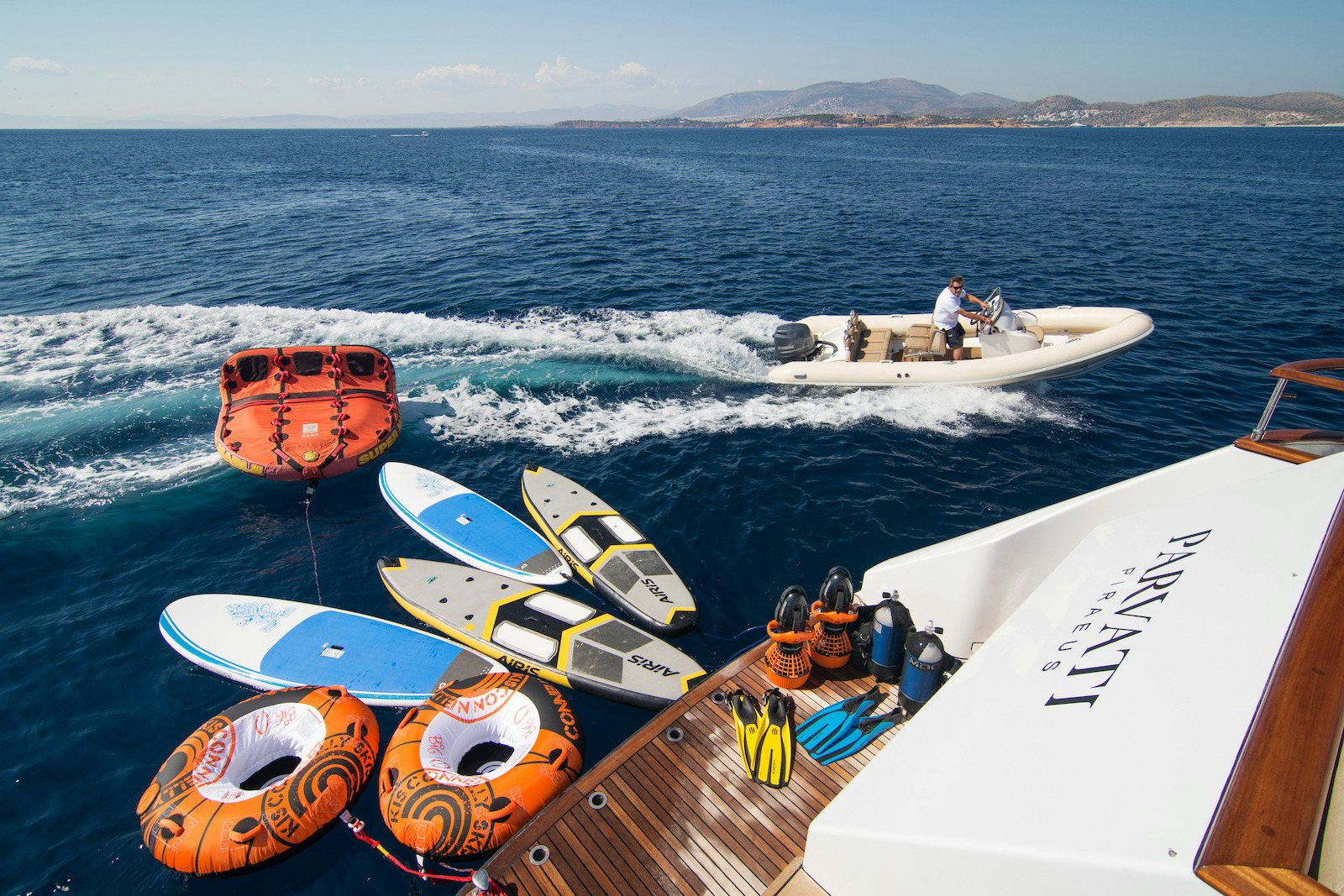a group of boats in the water aboard PARVATI Yacht for Sale