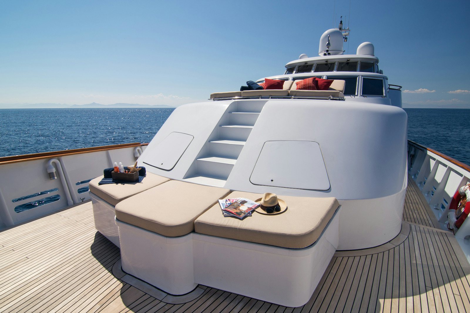 a white boat on a deck aboard PARVATI Yacht for Sale