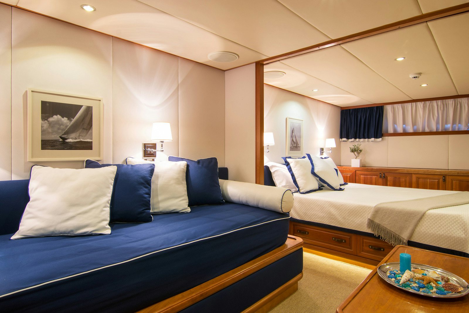 a hotel room with two beds aboard PARVATI Yacht for Sale