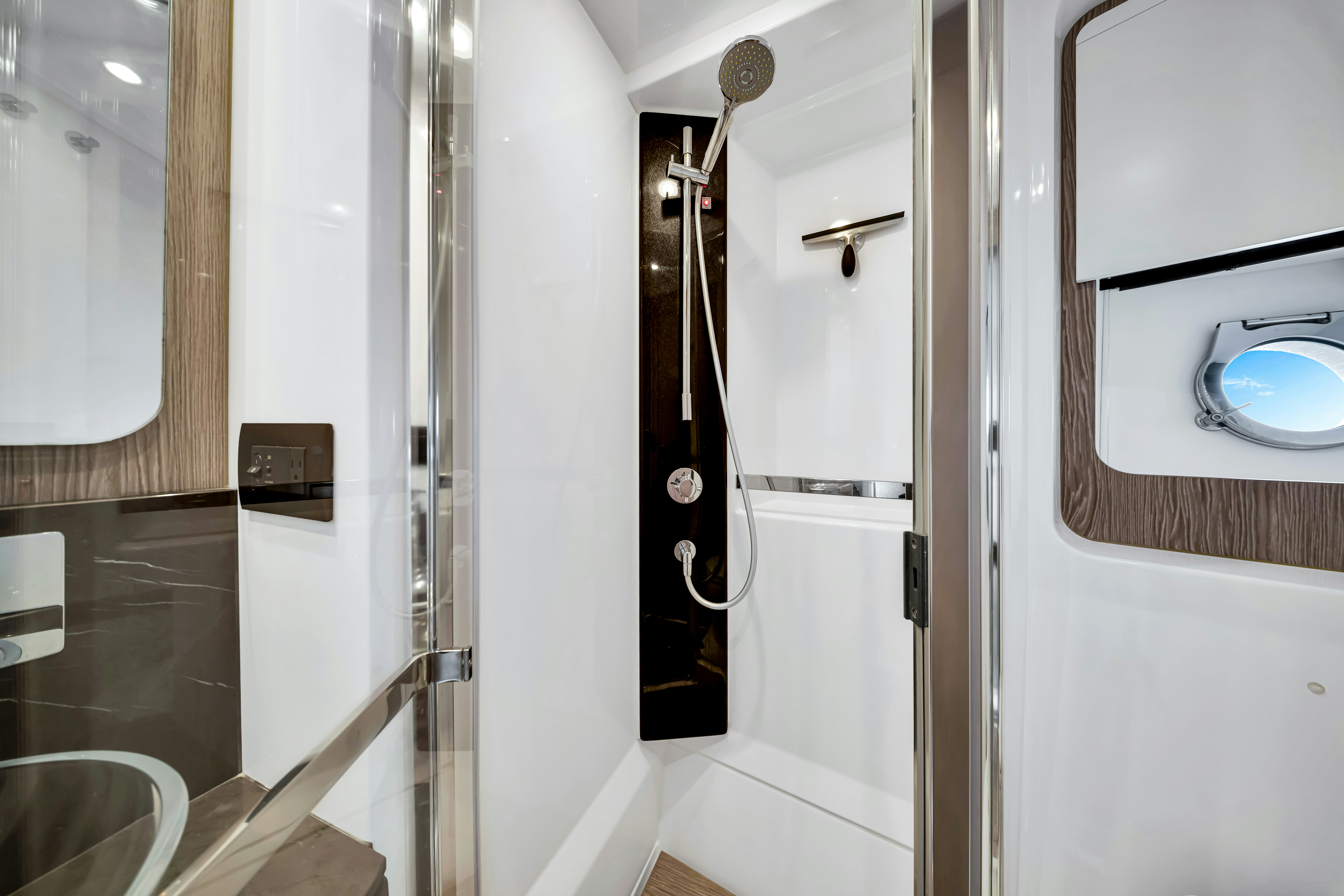 a bathroom with a shower unit aboard AMF Yacht for Sale