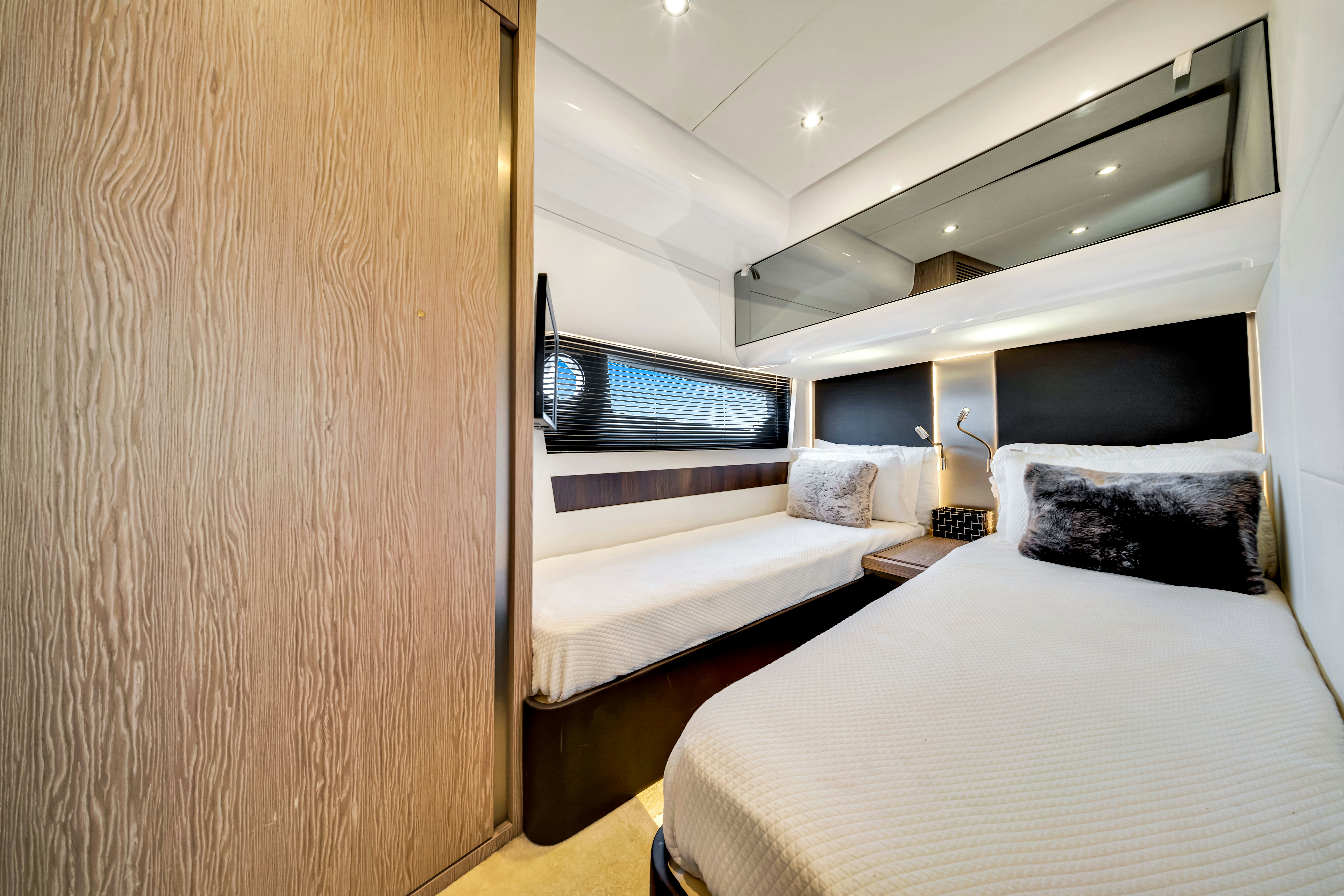 a room with two beds aboard AMF Yacht for Sale