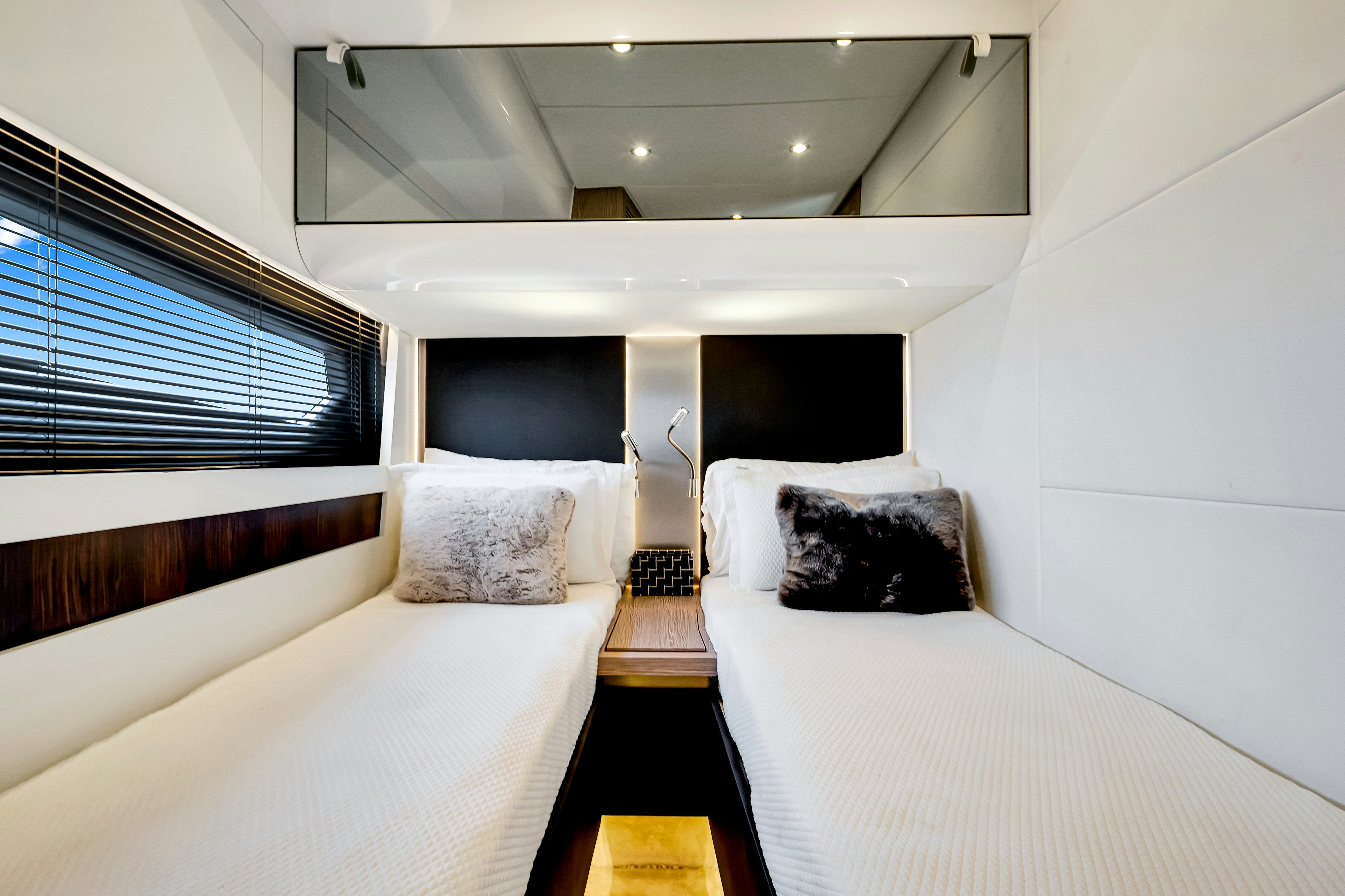 a room with two beds aboard AMF Yacht for Sale