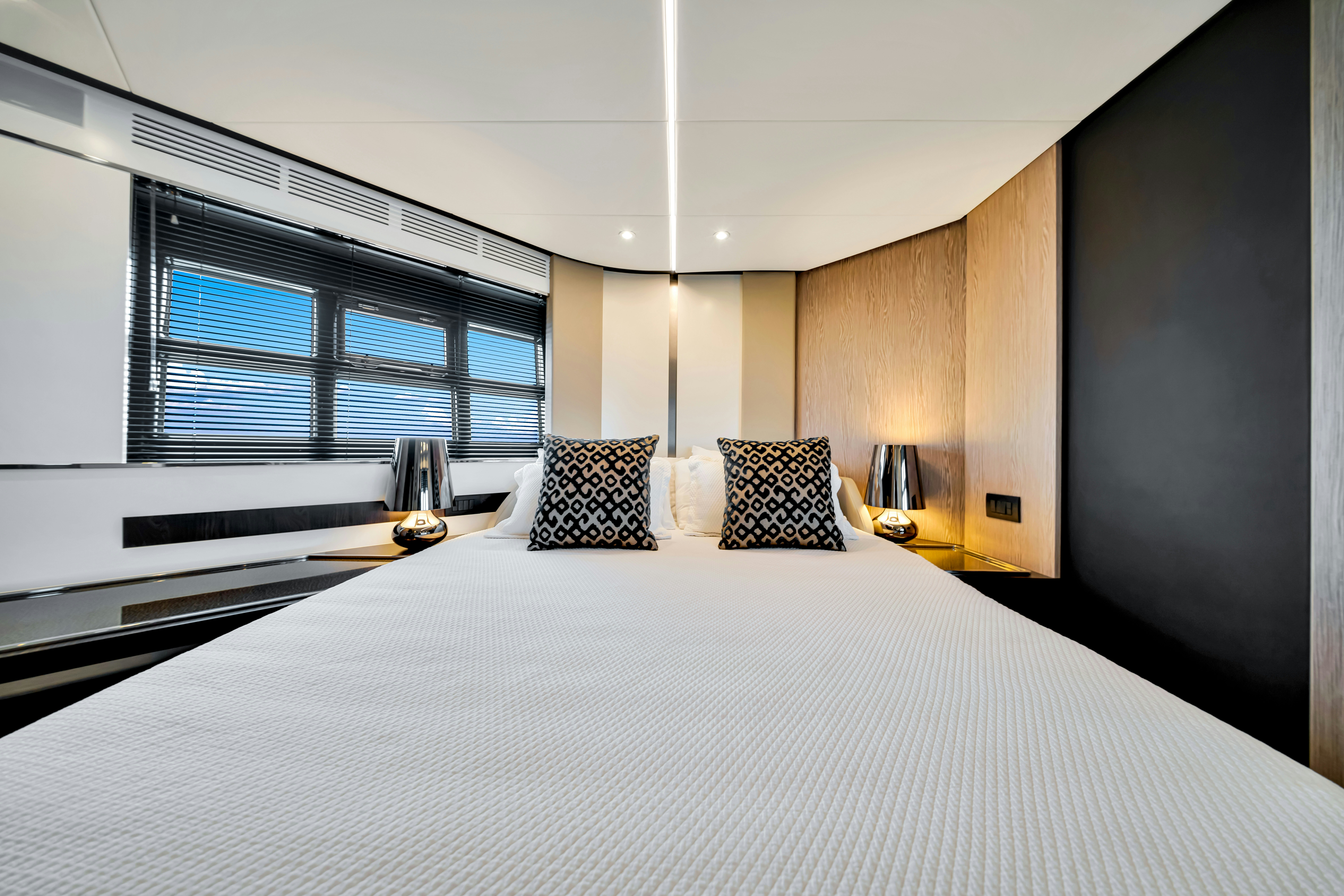 a large bed in a room aboard AMF Yacht for Sale
