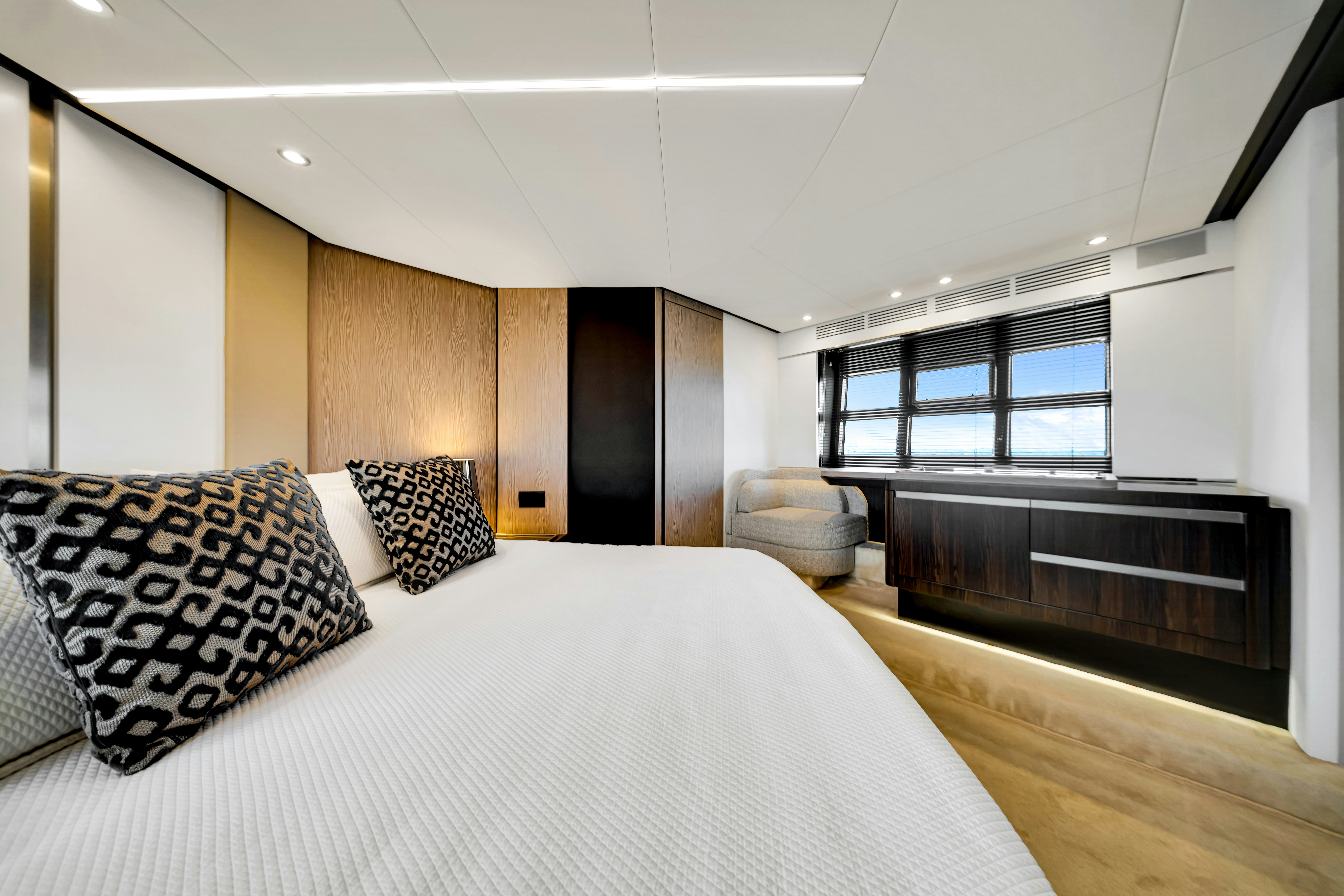 a large bed in a room aboard AMF Yacht for Sale