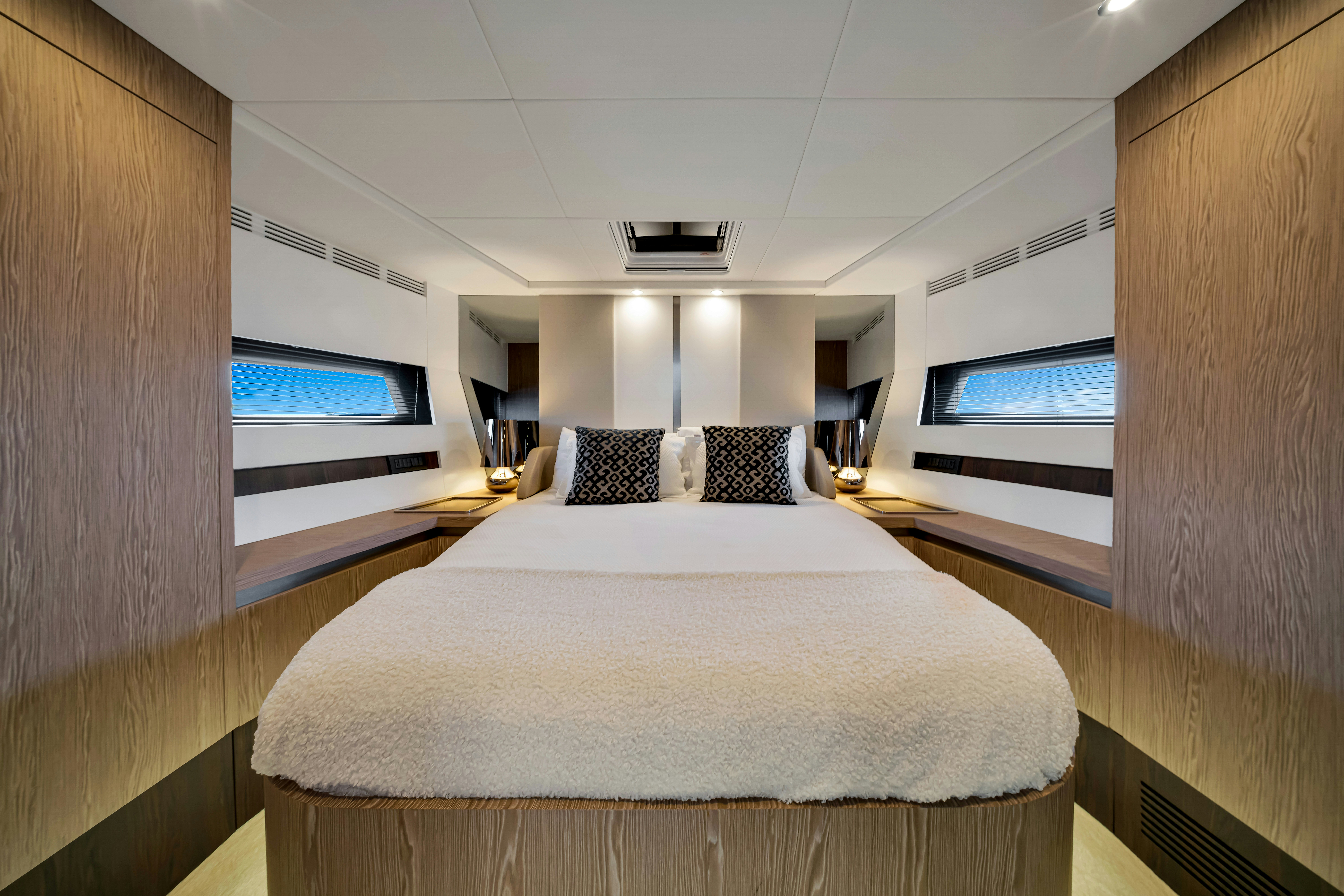 a large bed in a room aboard AMF Yacht for Sale