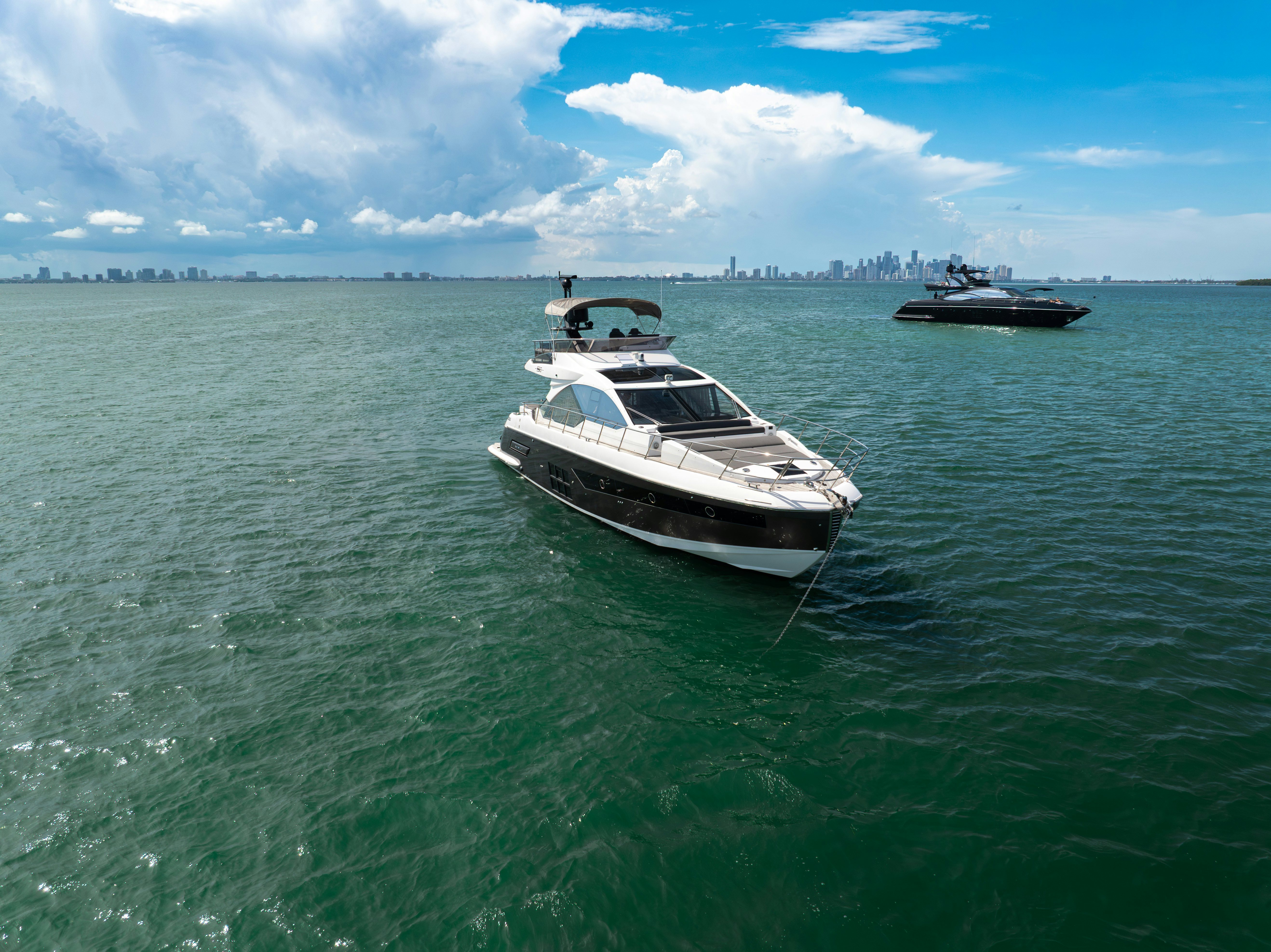 a couple of boats in the water aboard AMF Yacht for Sale