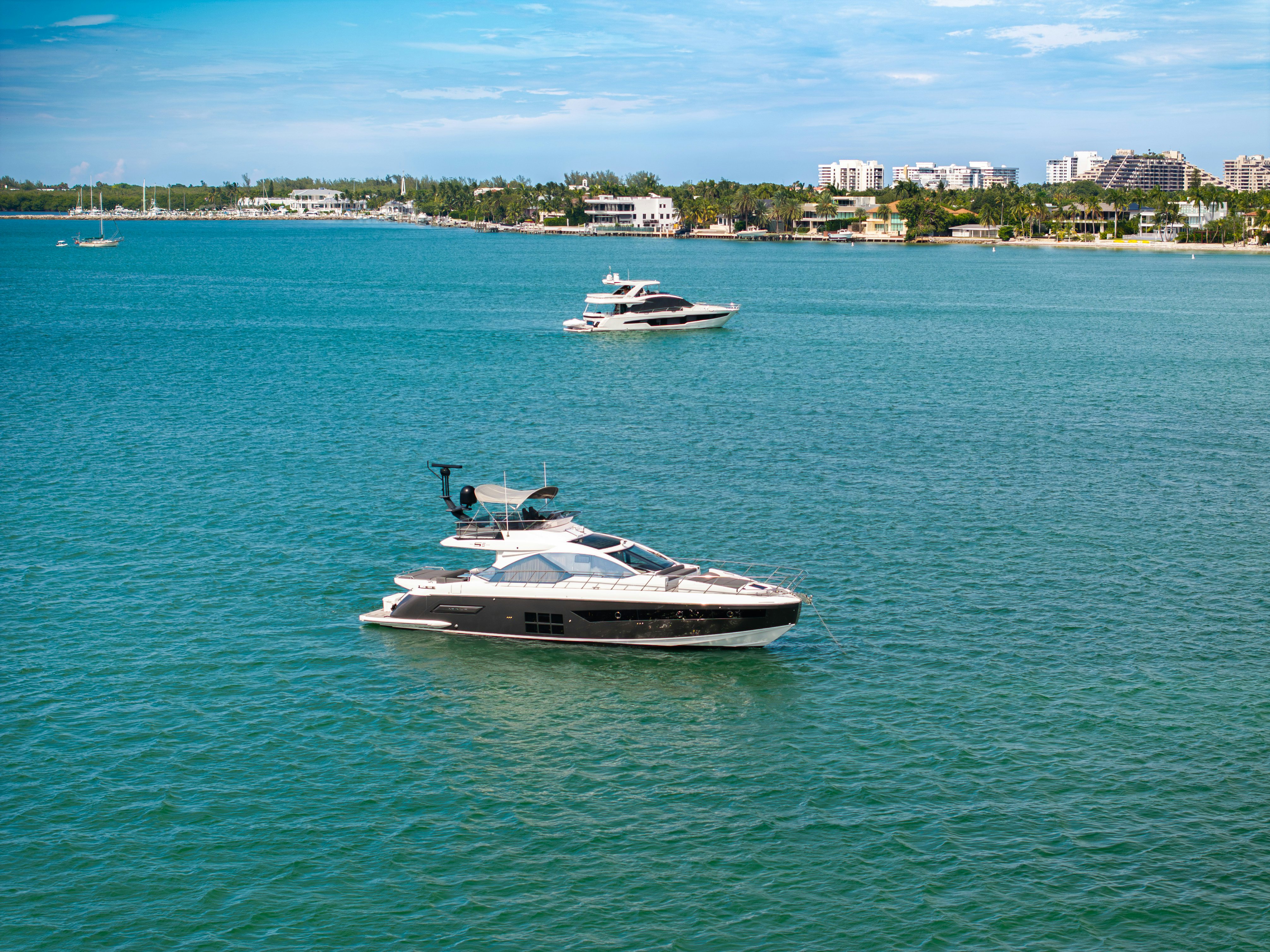 a couple of boats in the water aboard AMF Yacht for Sale