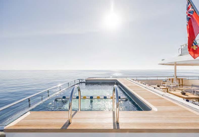 a deck with a flag on it aboard HBC Yacht for Sale