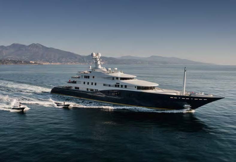 a large ship on the water aboard HBC Yacht for Sale