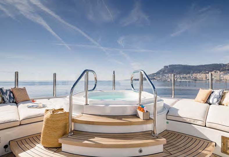 a large pool with pillows aboard HBC Yacht for Sale