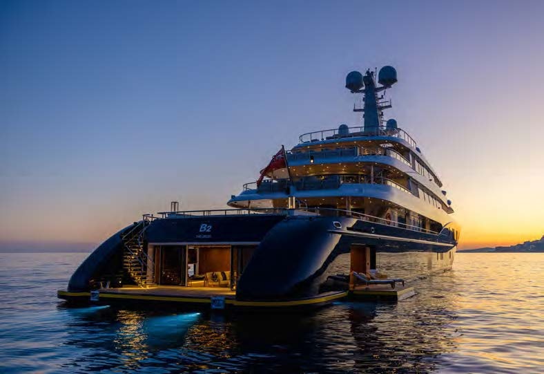 a couple of boats on the water aboard HBC Yacht for Sale