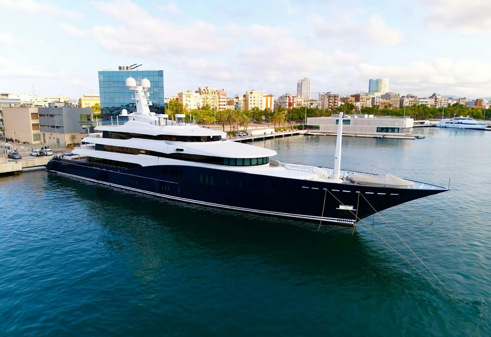 a large ship in the water aboard HBC Yacht for Sale