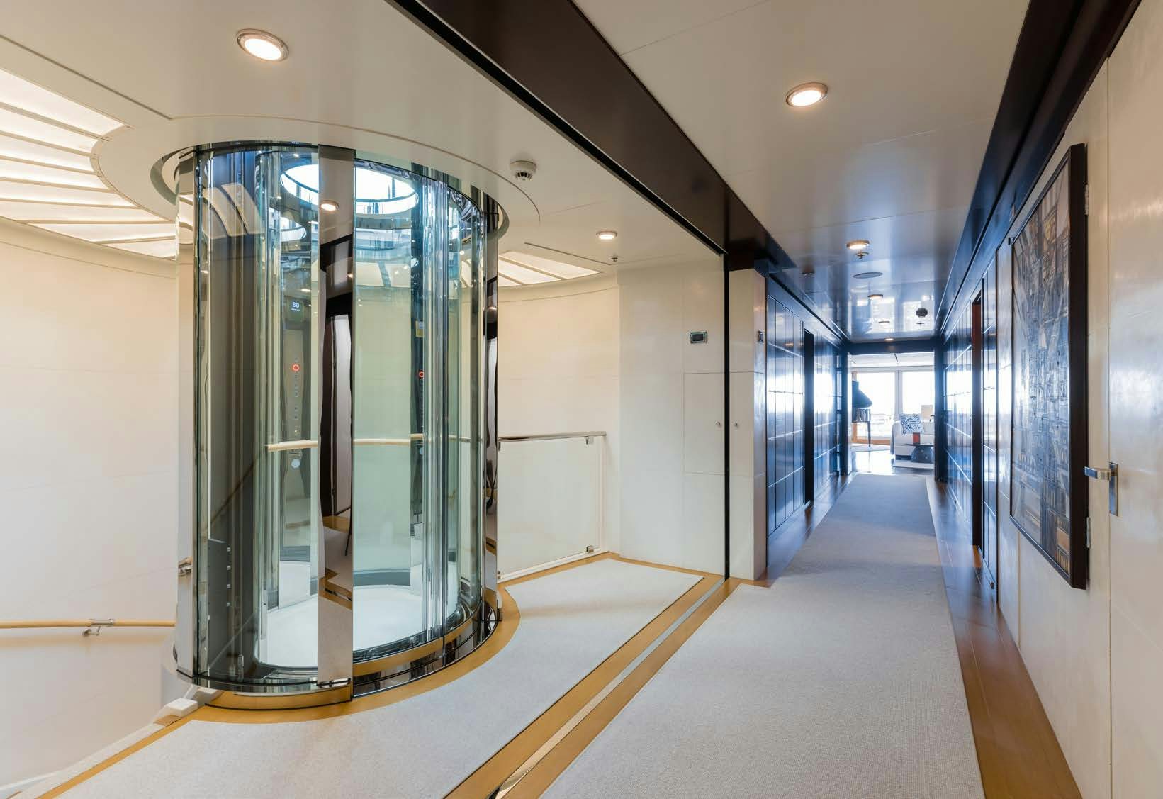 a large glass door in a building aboard HBC Yacht for Sale