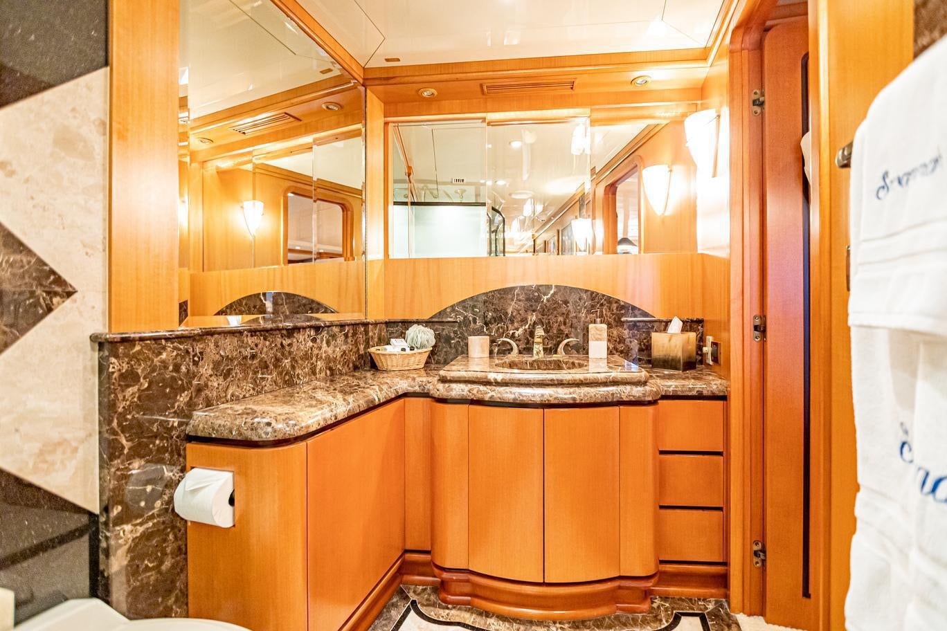 a bathroom with a large sink aboard XOXO (118') Yacht for Charter