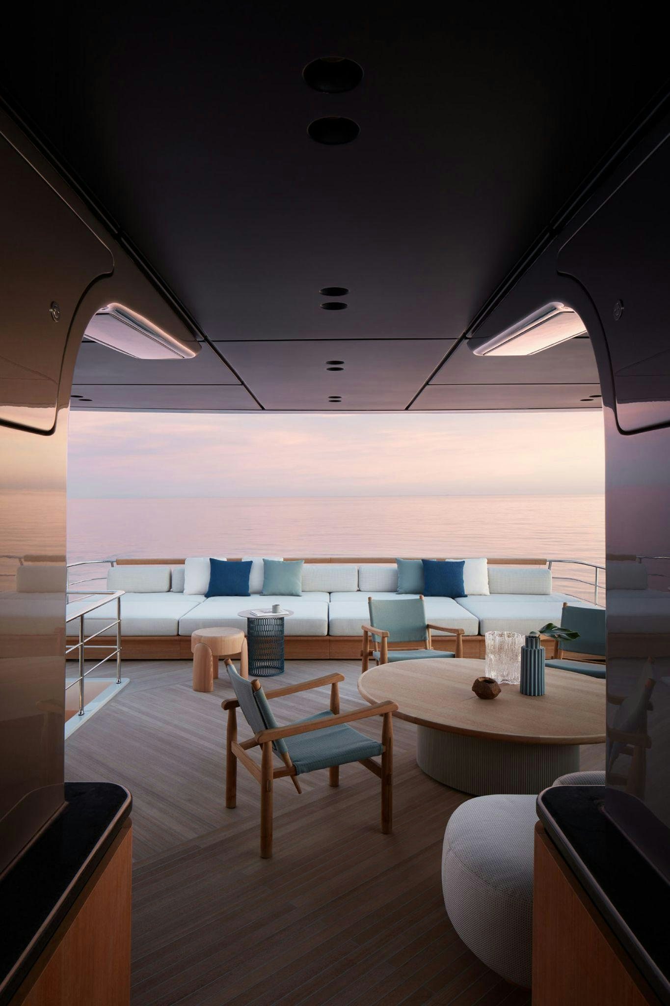 a room with a table and chairs aboard AKIRA Yacht for Charter