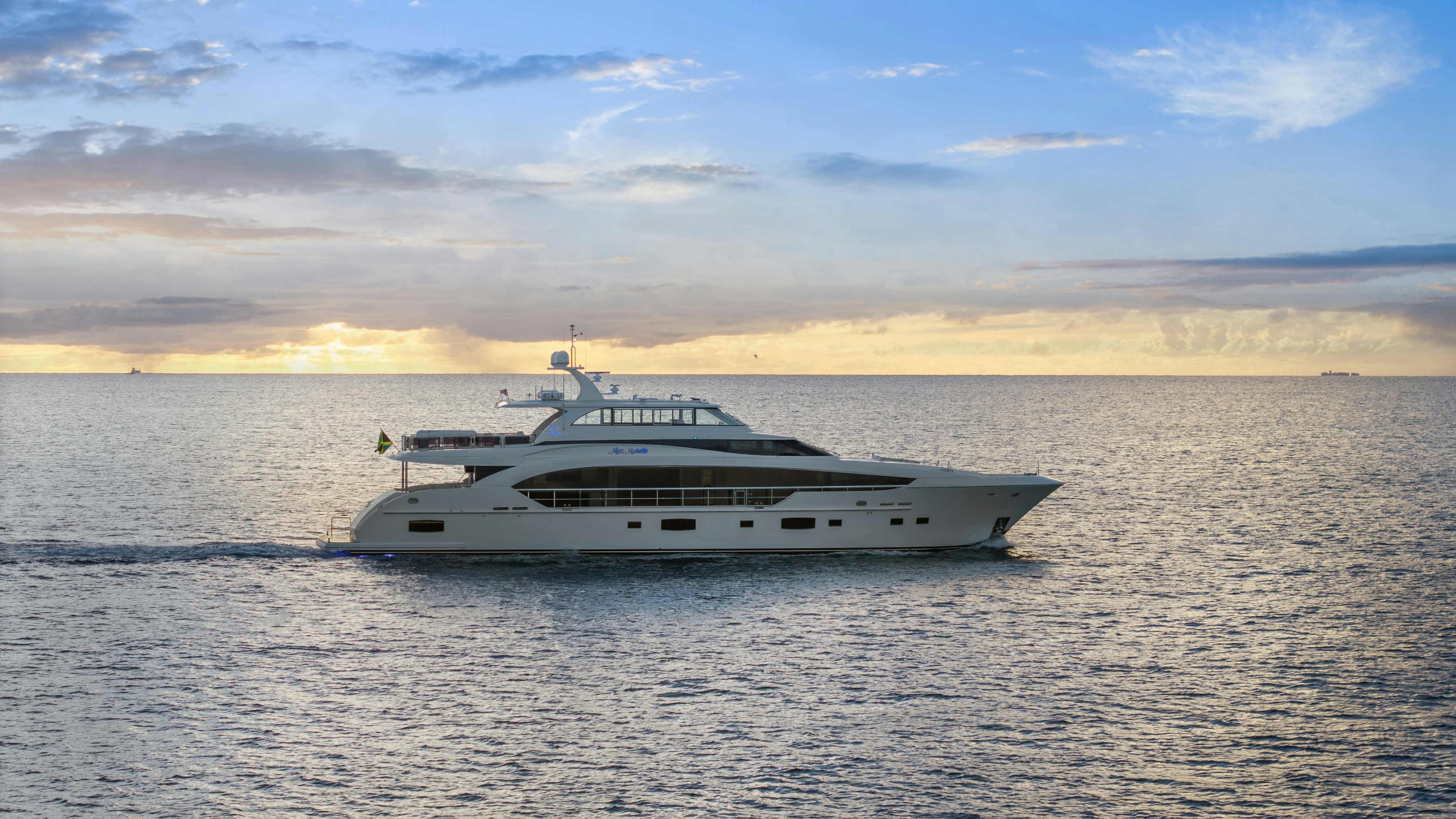 a white yacht in the water aboard MISS MICHELLE Yacht for Sale