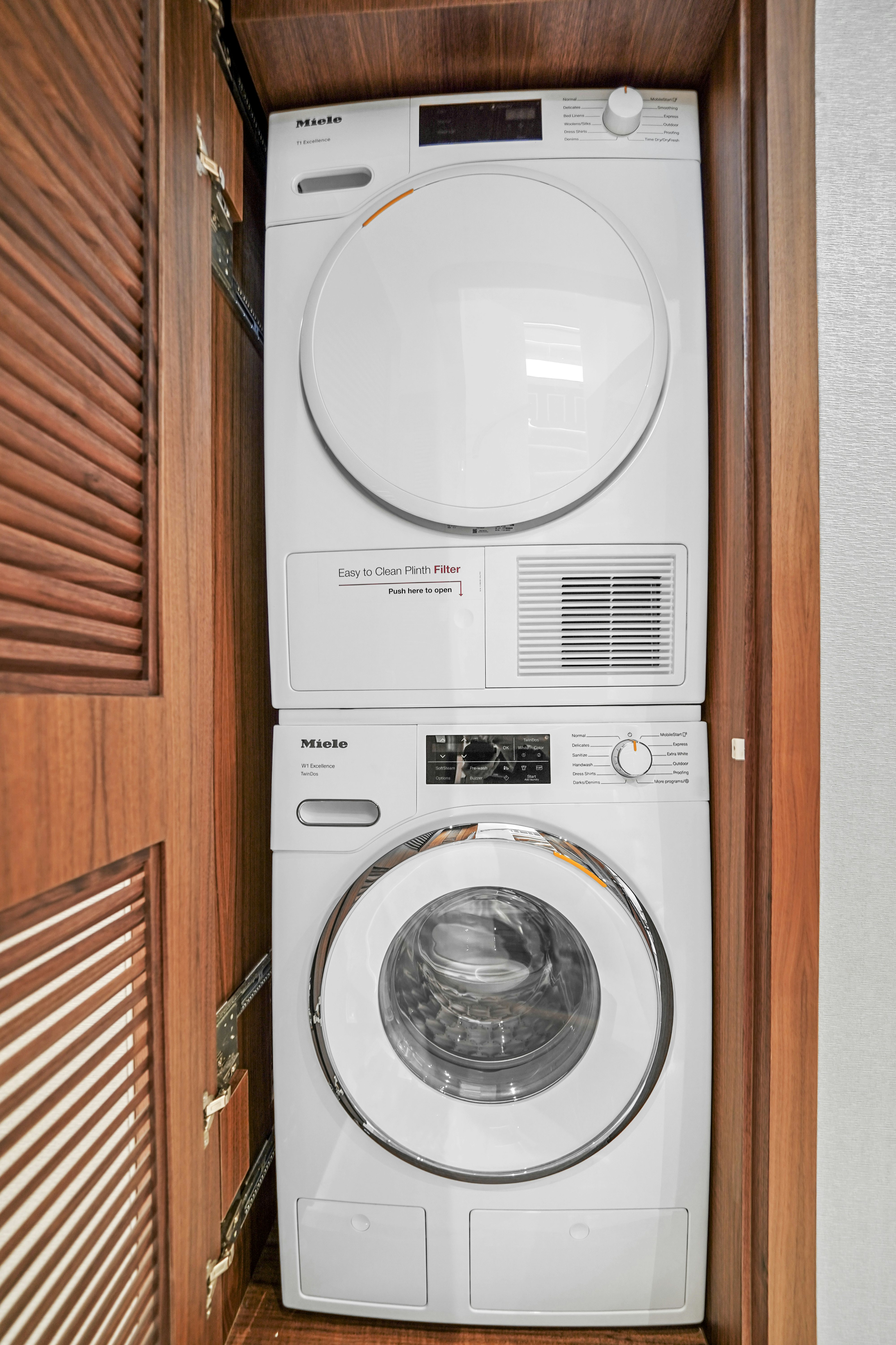 a washing machine in a room aboard MISS MICHELLE Yacht for Sale