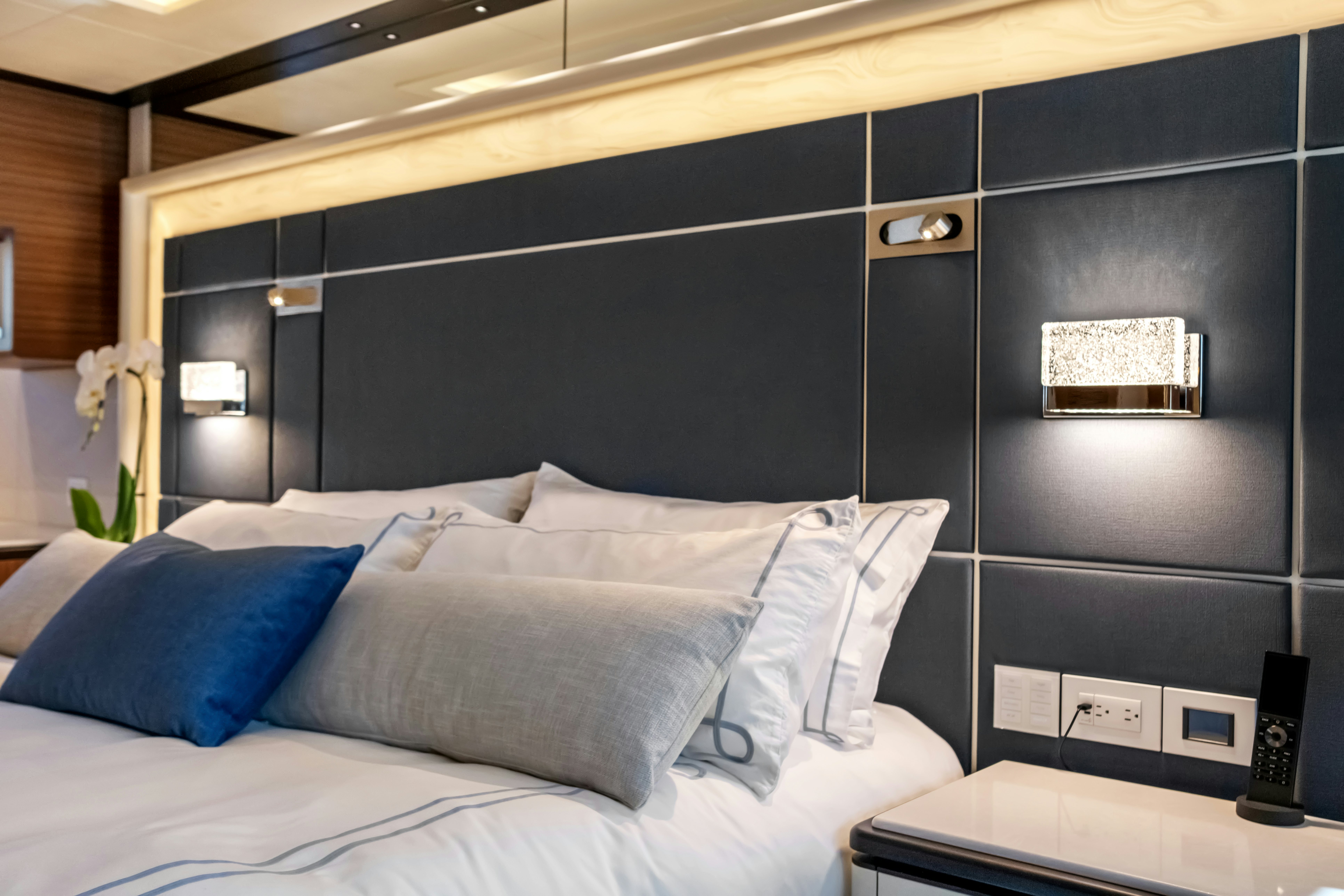 a bed with white sheets aboard MISS MICHELLE Yacht for Sale