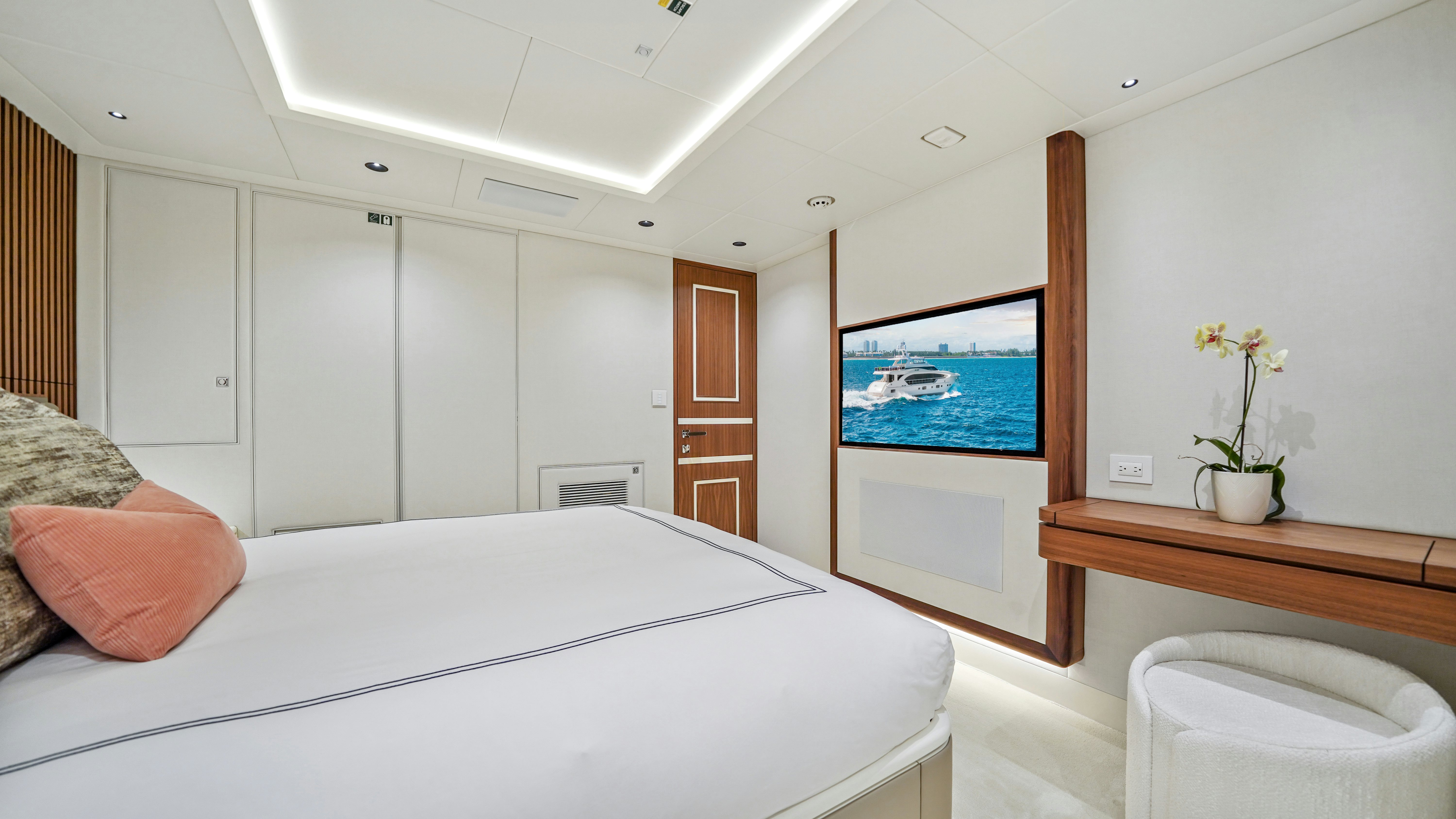 a bed in a room aboard MISS MICHELLE Yacht for Sale