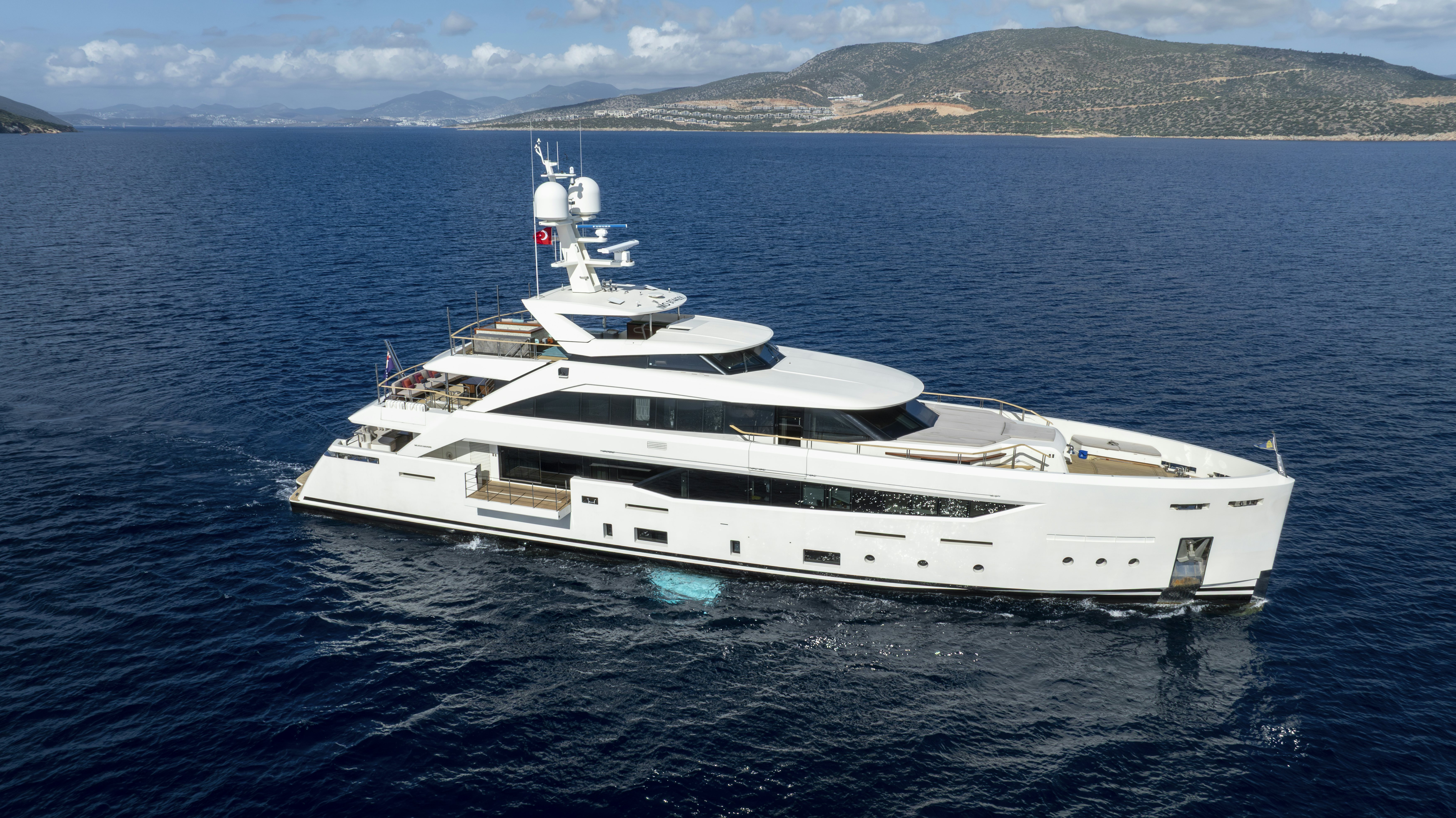 a white yacht in the water aboard SERENITY Yacht for Sale