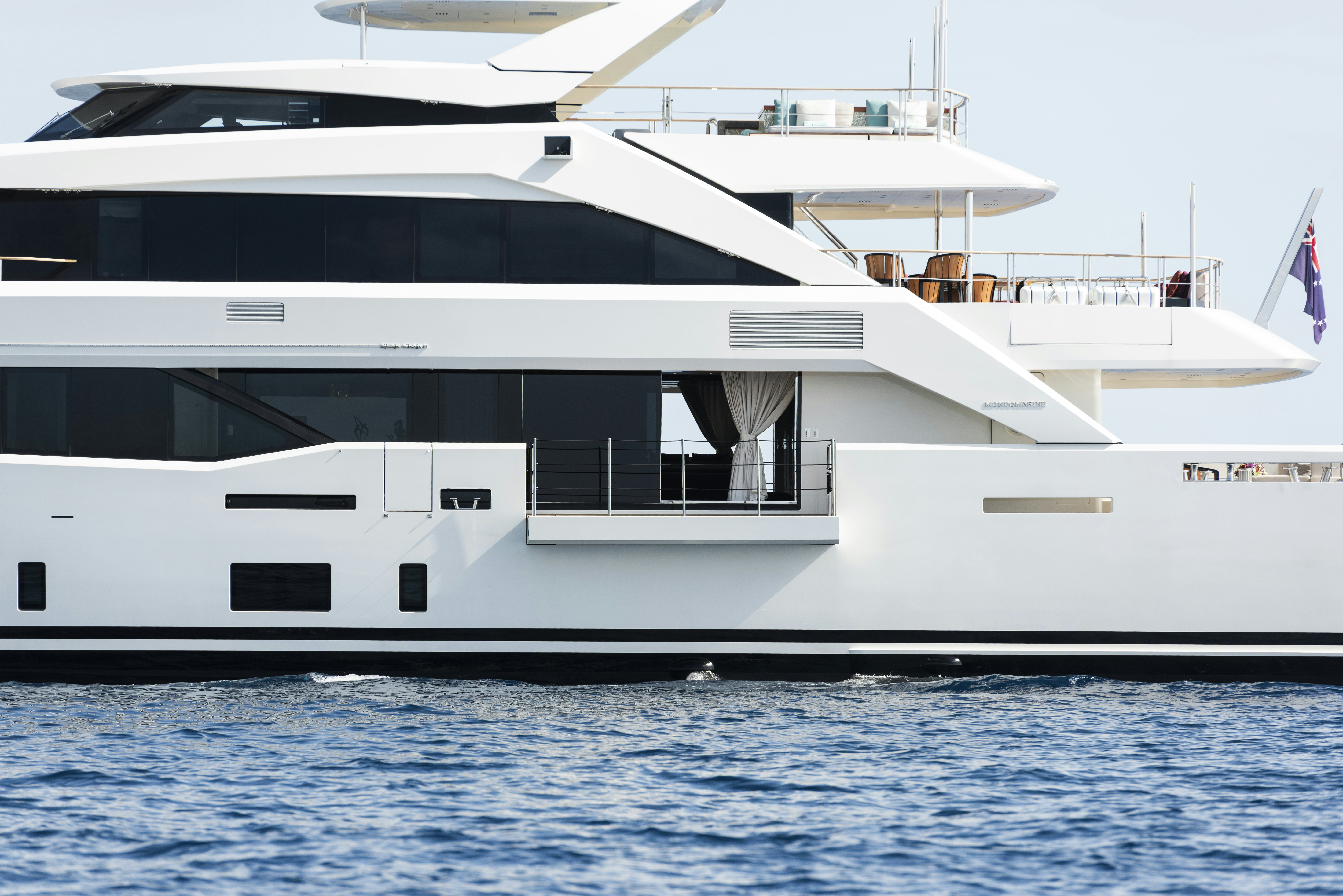 a large white yacht aboard SERENITY Yacht for Sale