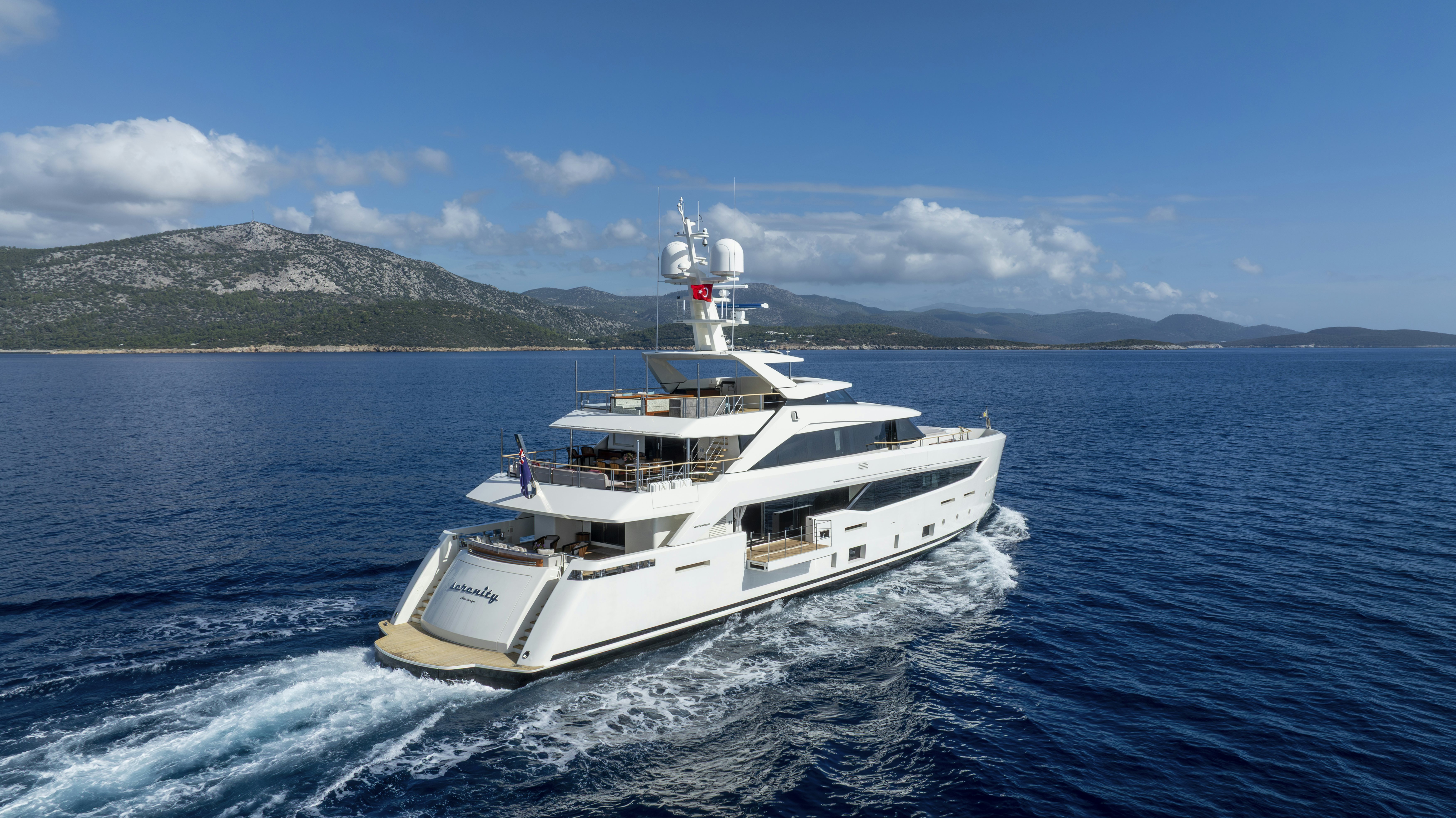 a white yacht on the water aboard SERENITY Yacht for Sale