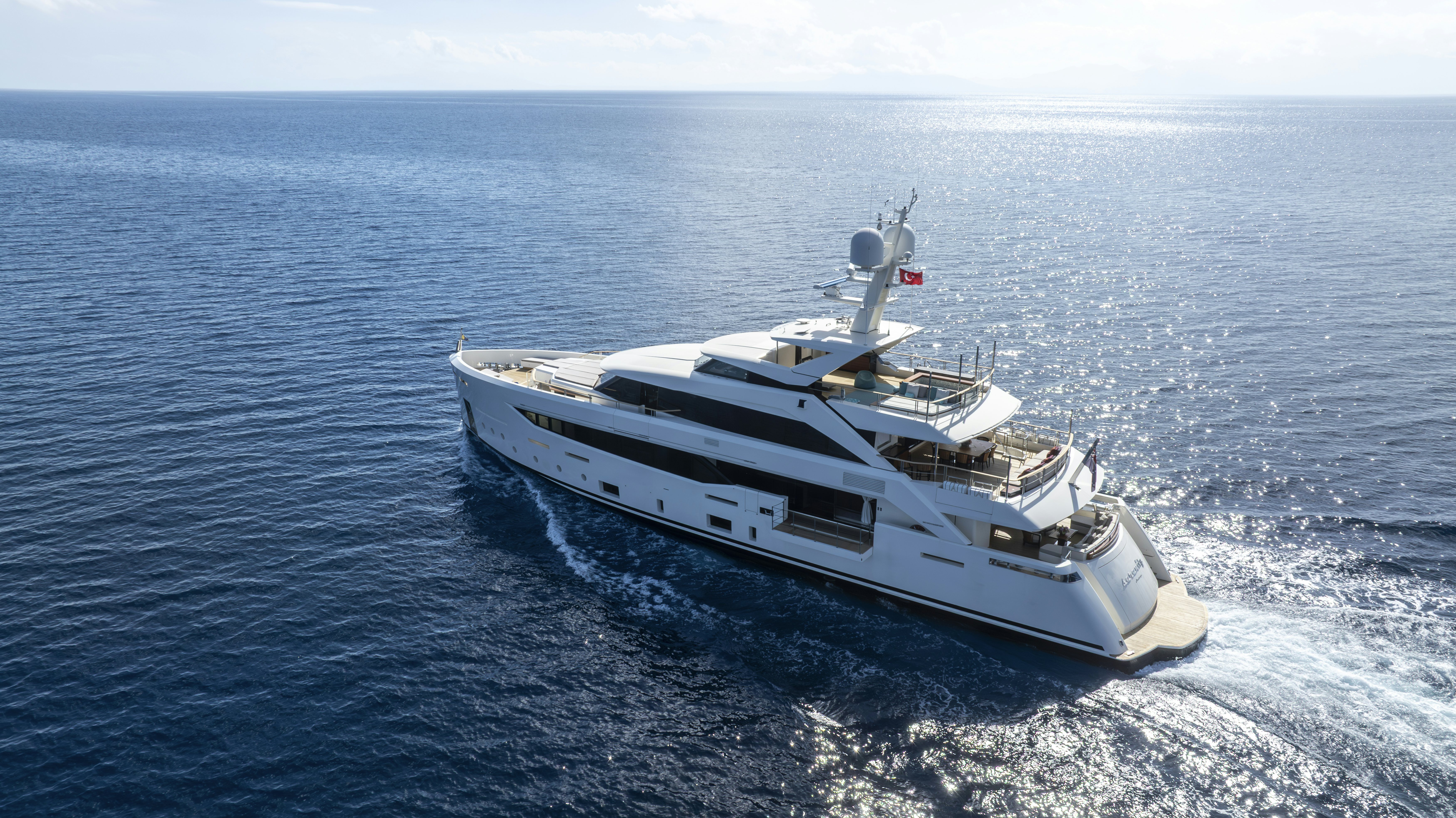 a white boat in the water aboard SERENITY Yacht for Sale