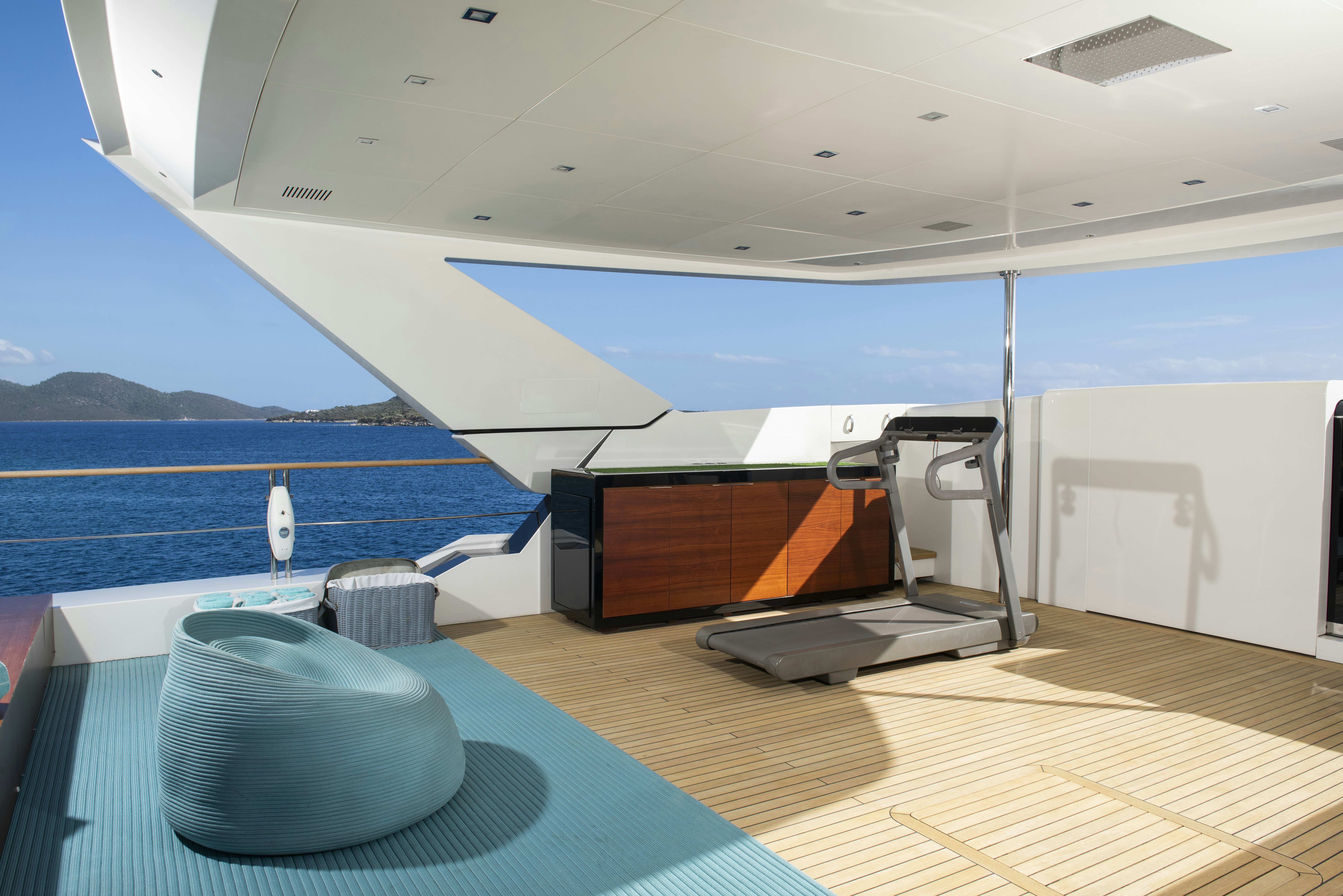 a large boat on the water aboard SERENITY Yacht for Sale