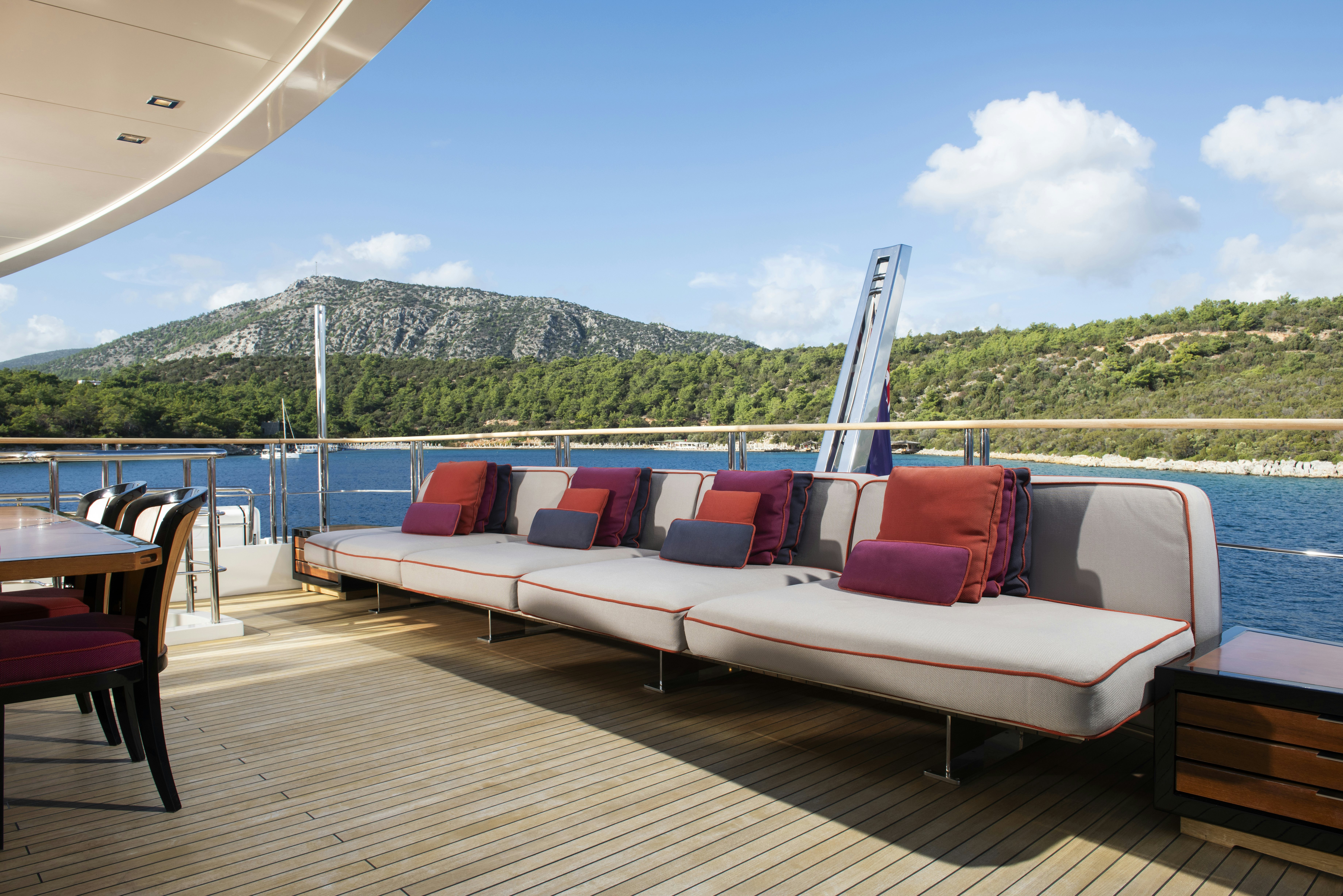 a large bed on a deck aboard SERENITY Yacht for Sale