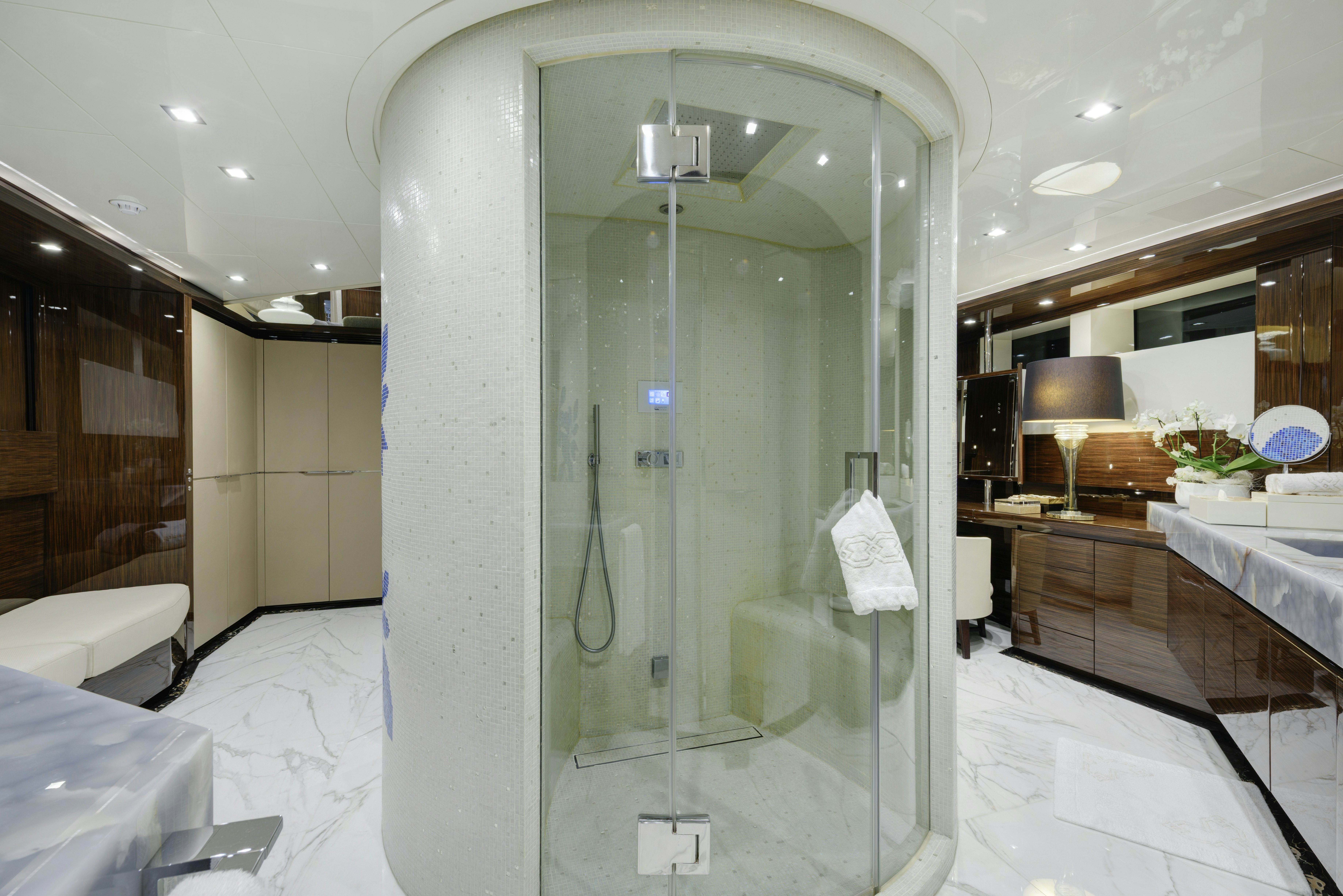 a large glass shower in a bathroom aboard SERENITY Yacht for Sale