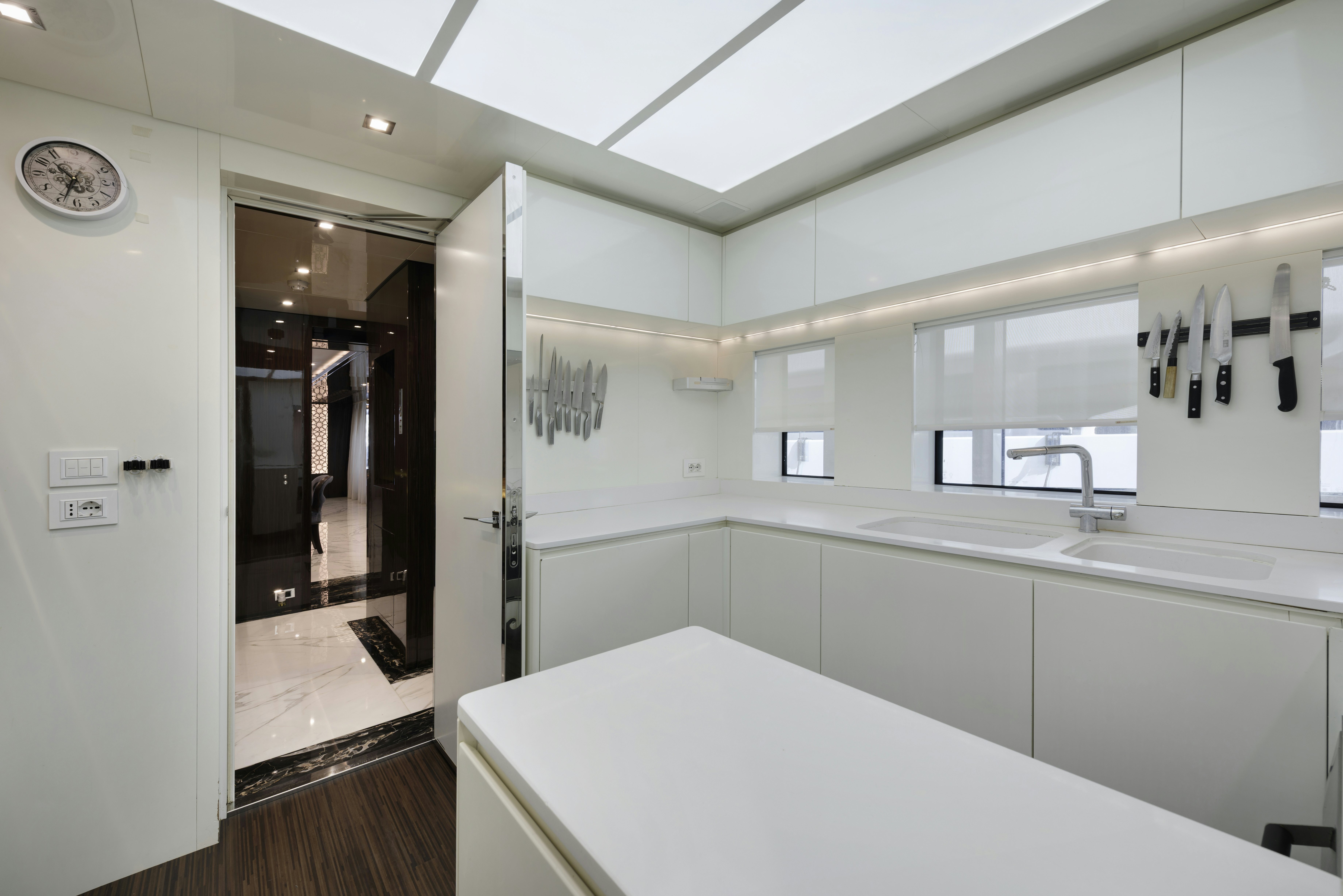 a kitchen with a large sink aboard SERENITY Yacht for Sale