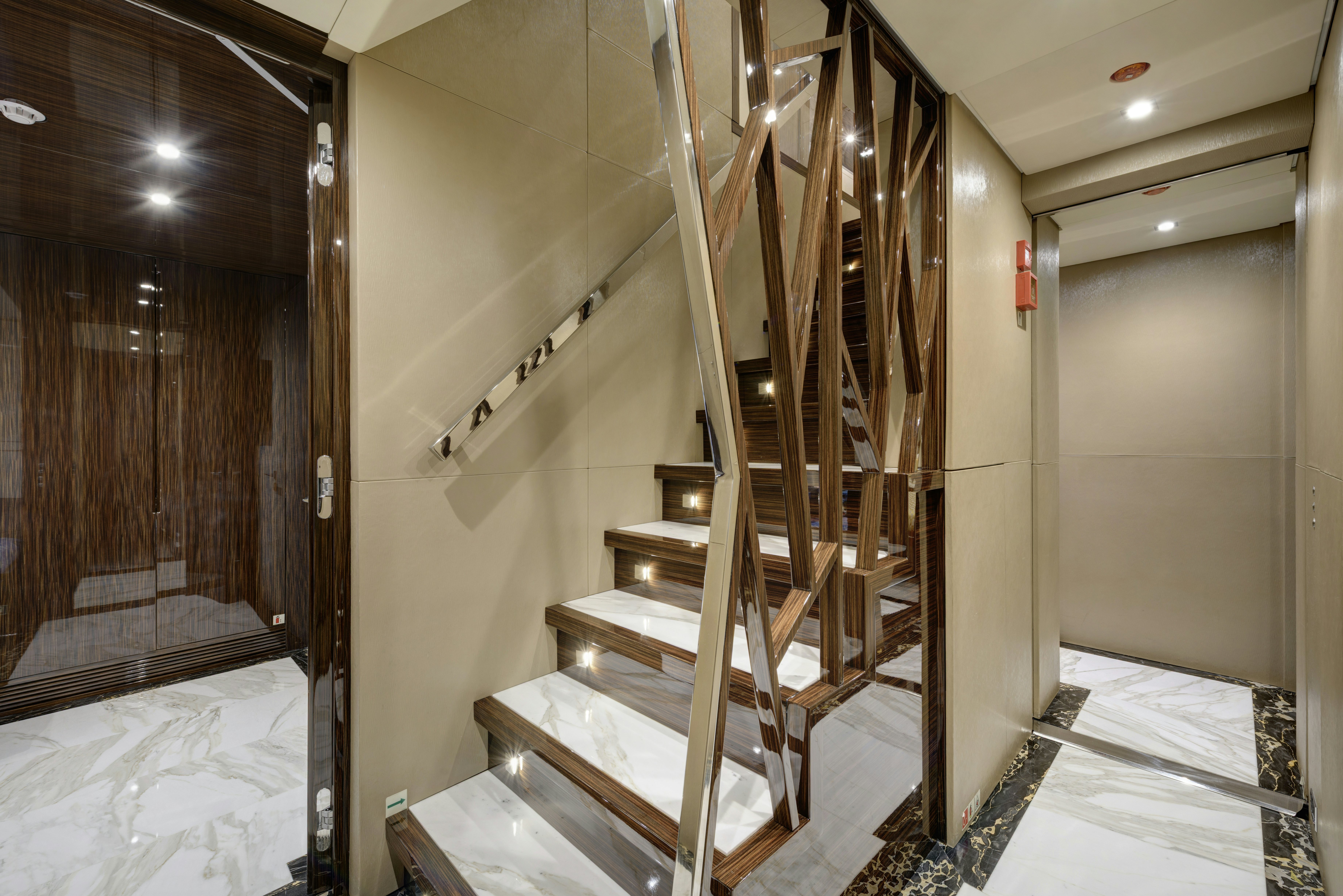 a staircase in a building aboard SERENITY Yacht for Sale