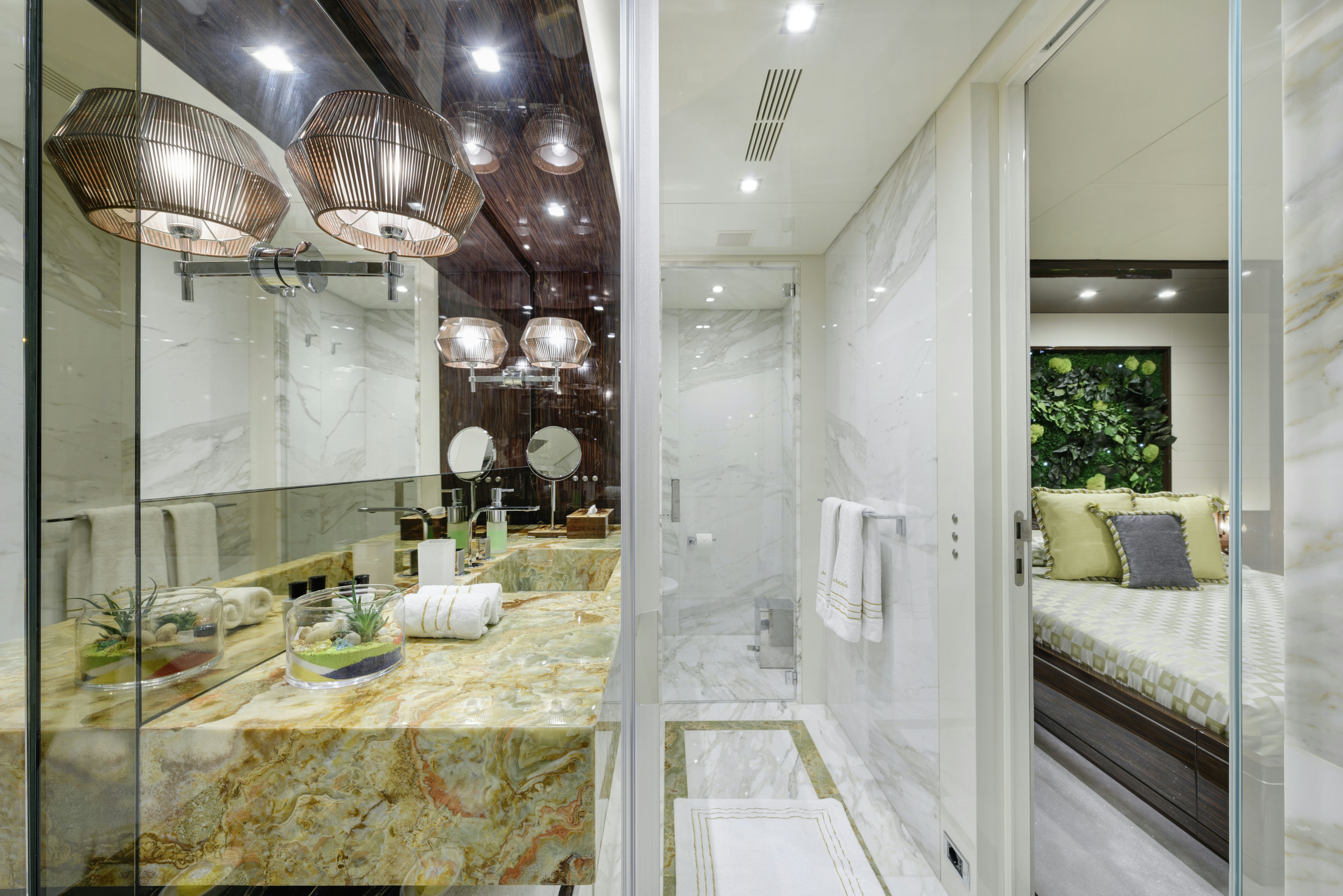 a bathroom with a large mirror aboard SERENITY Yacht for Sale