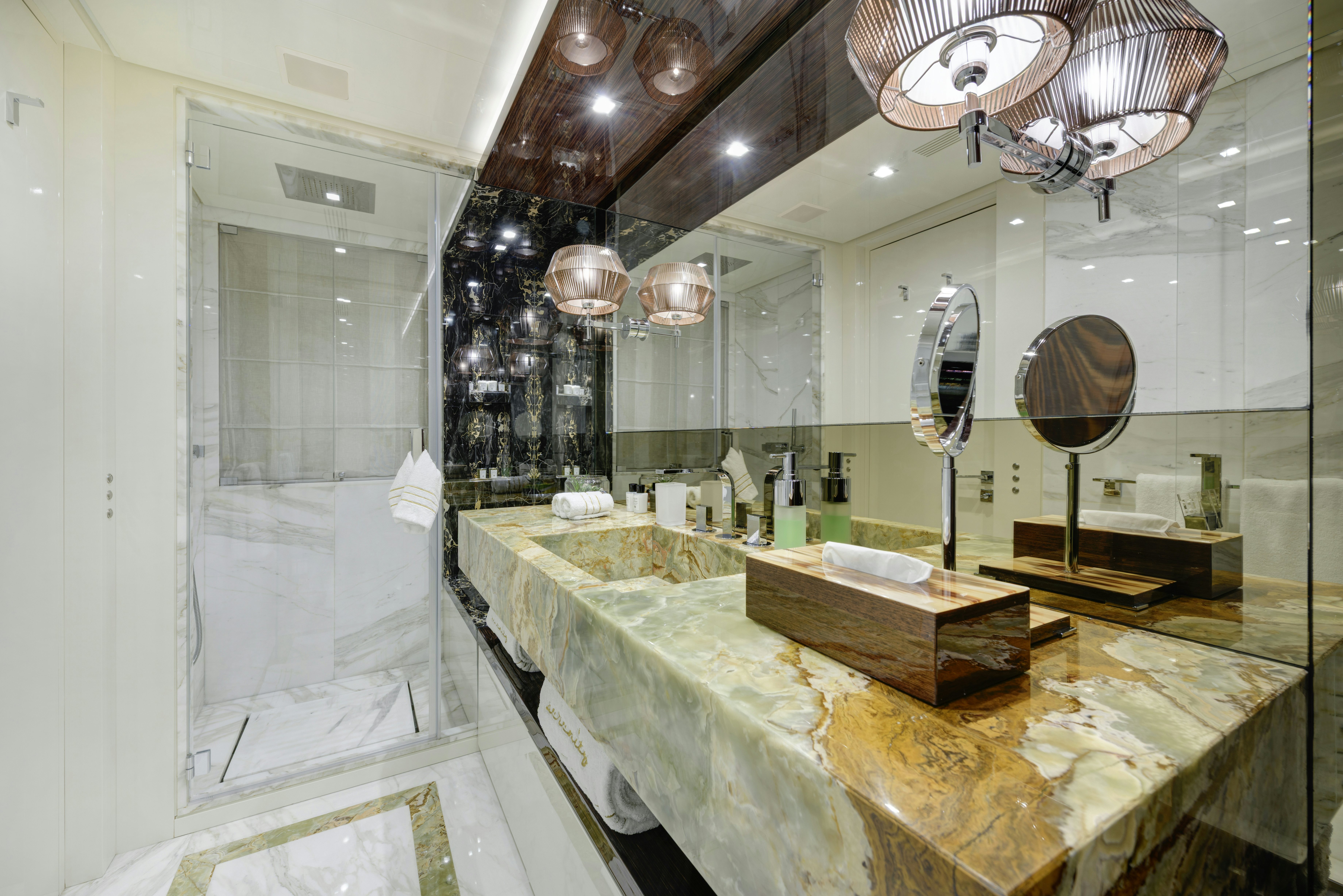 a bathroom with a large countertop aboard SERENITY Yacht for Sale