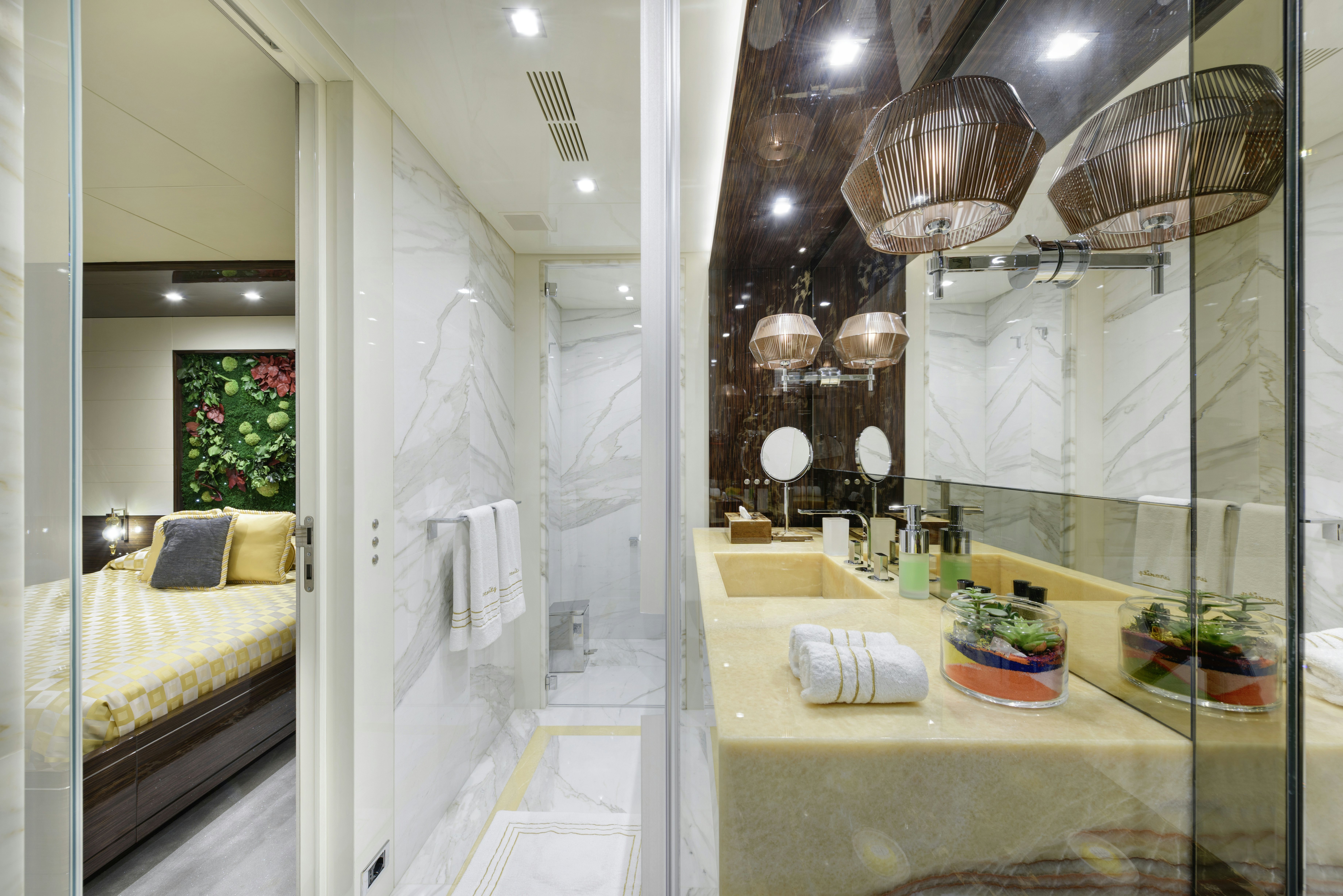 a bathroom with a glass shower aboard SERENITY Yacht for Sale