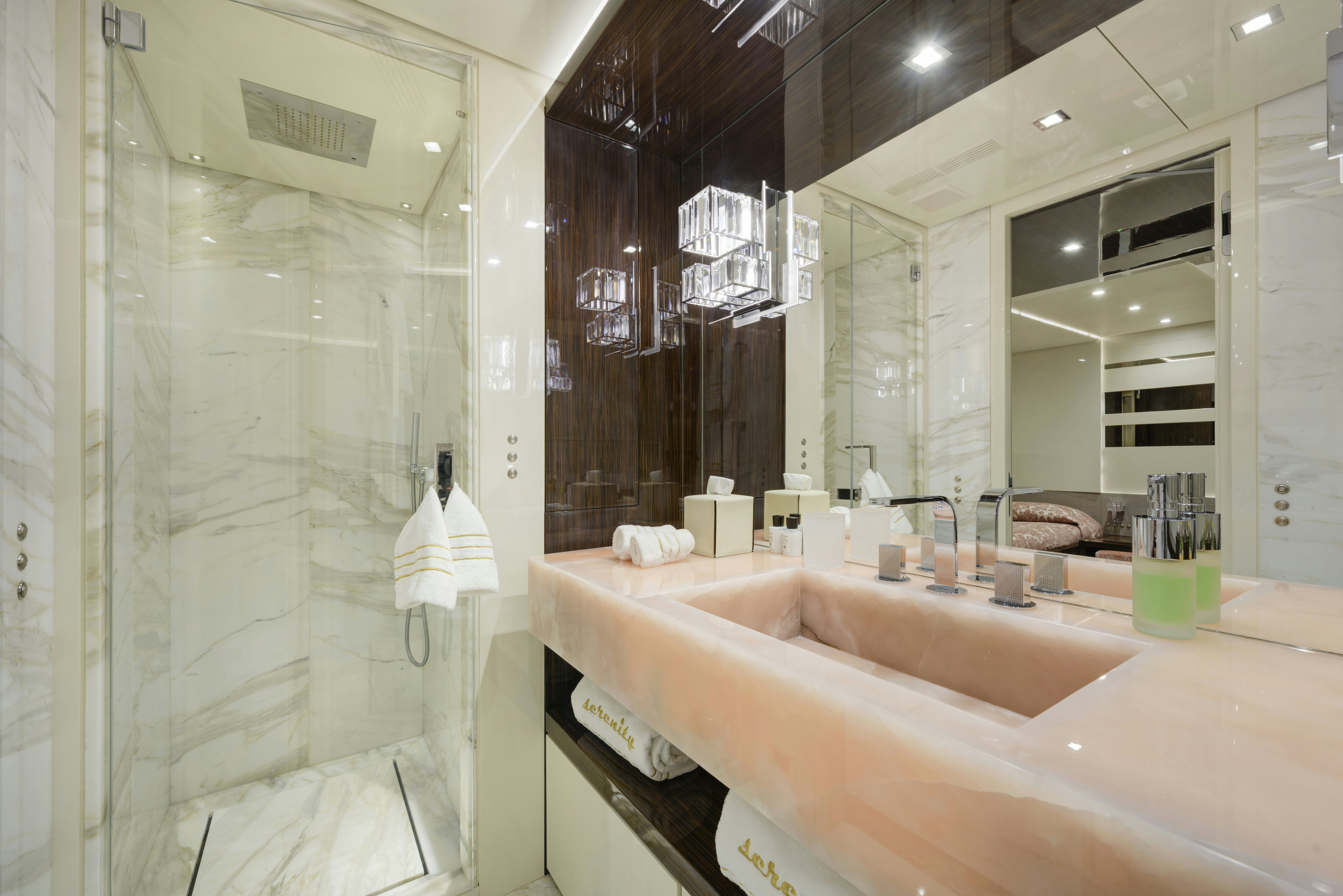 a bathroom with a large bathtub aboard SERENITY Yacht for Sale
