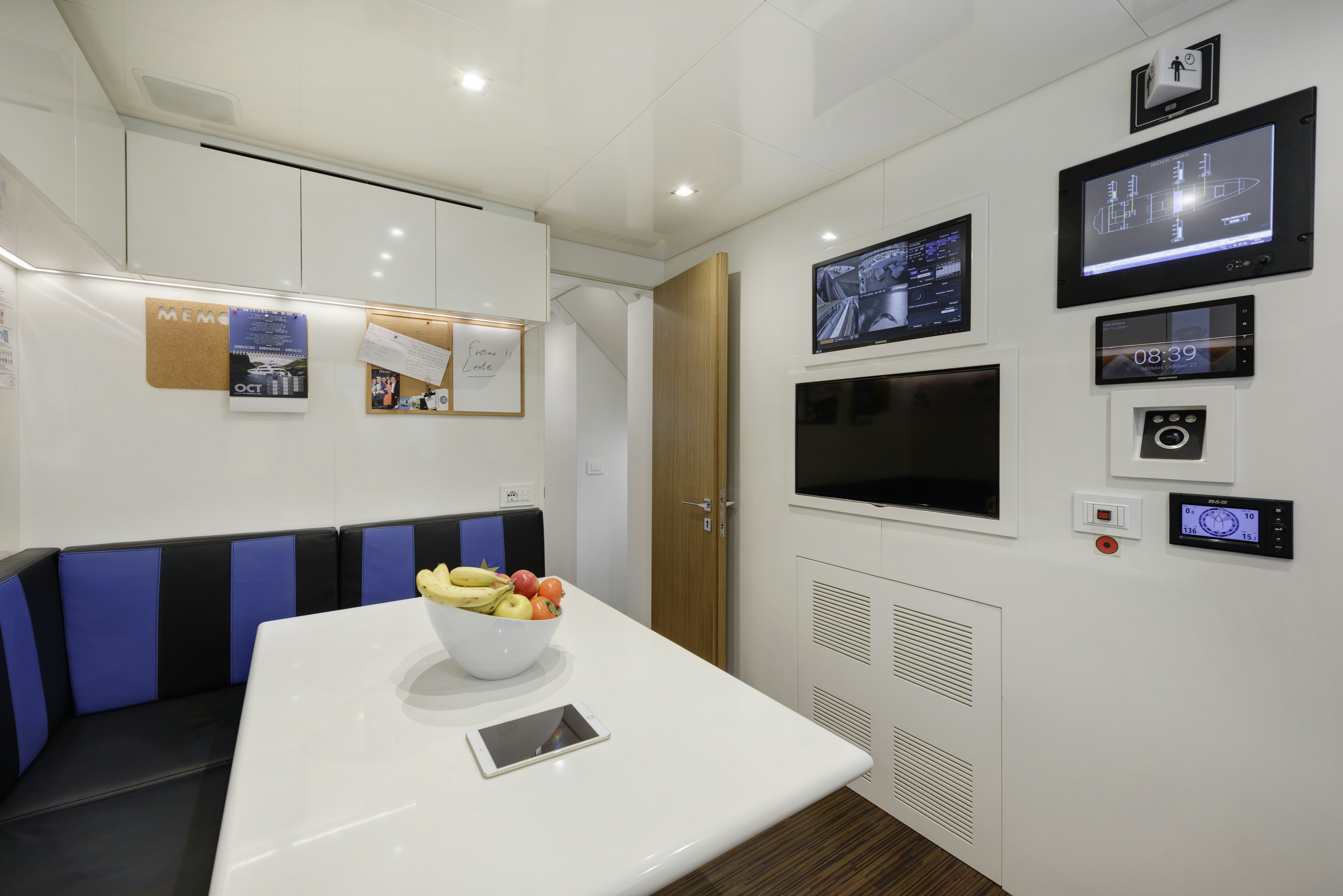 a bowl of fruit on a table aboard SERENITY Yacht for Sale