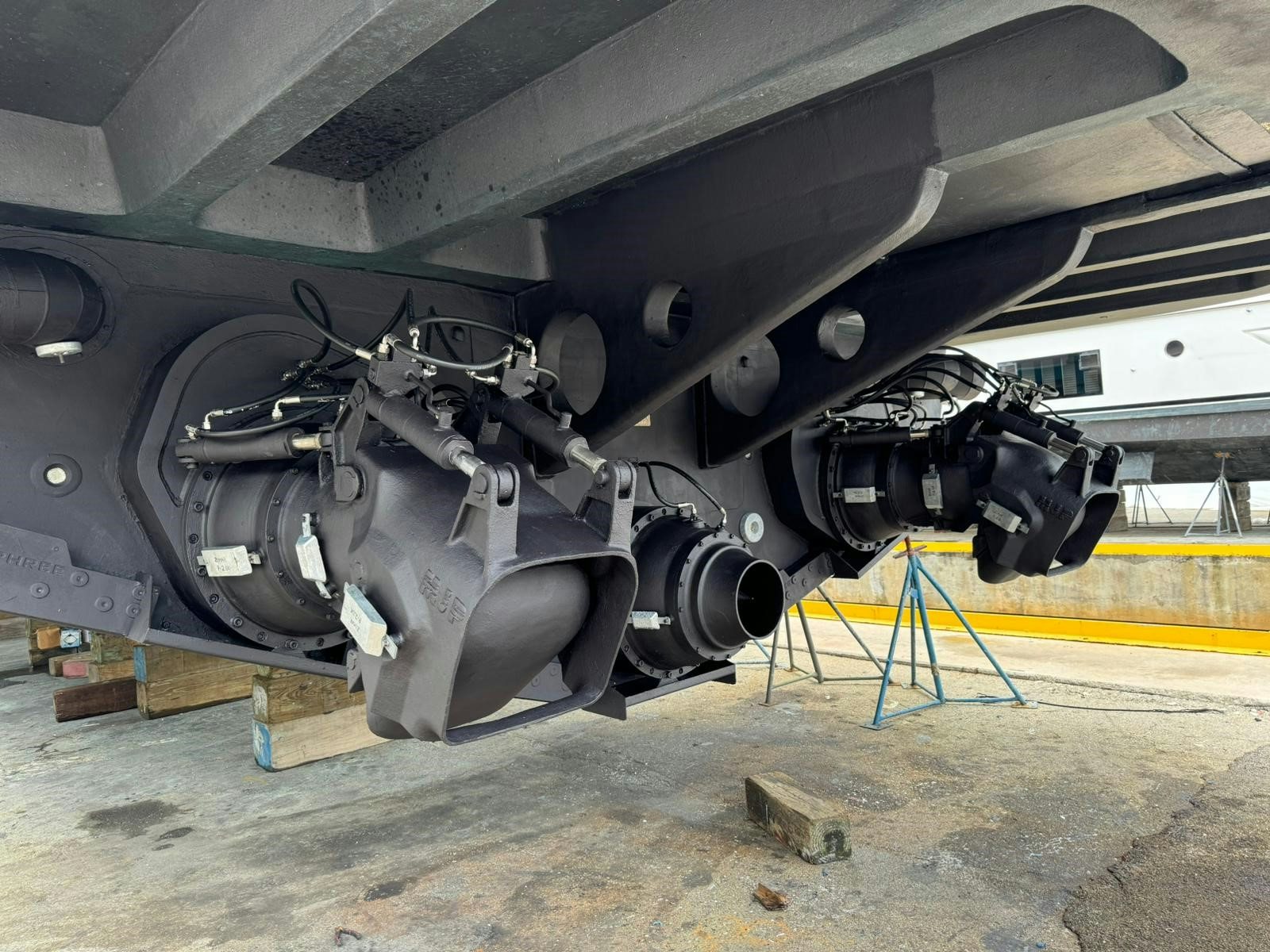 a large black vehicle aboard SILVER MAMA Yacht for Sale