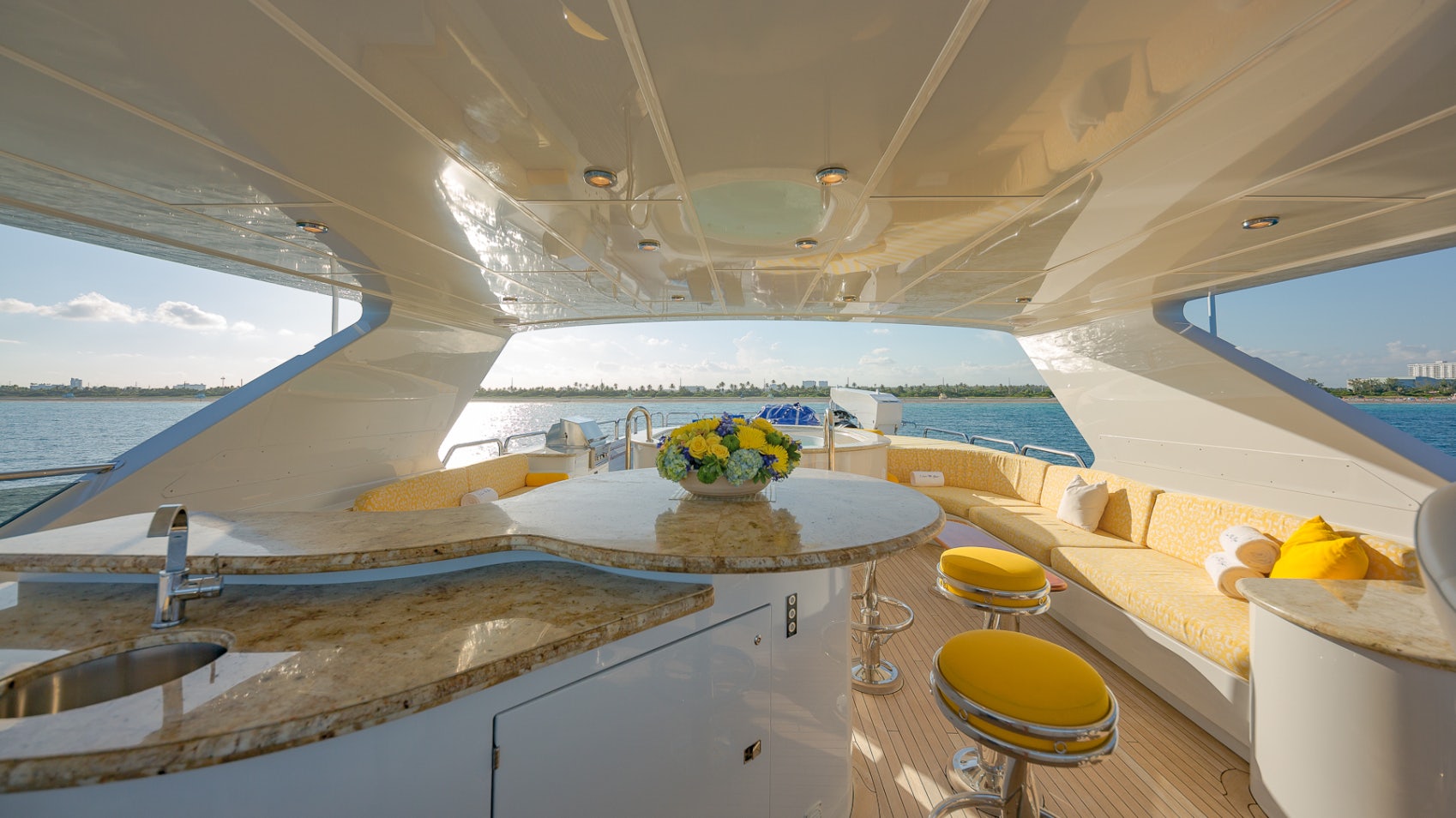 a room with a table and chairs aboard I LOVE THIS BOAT Yacht for Sale