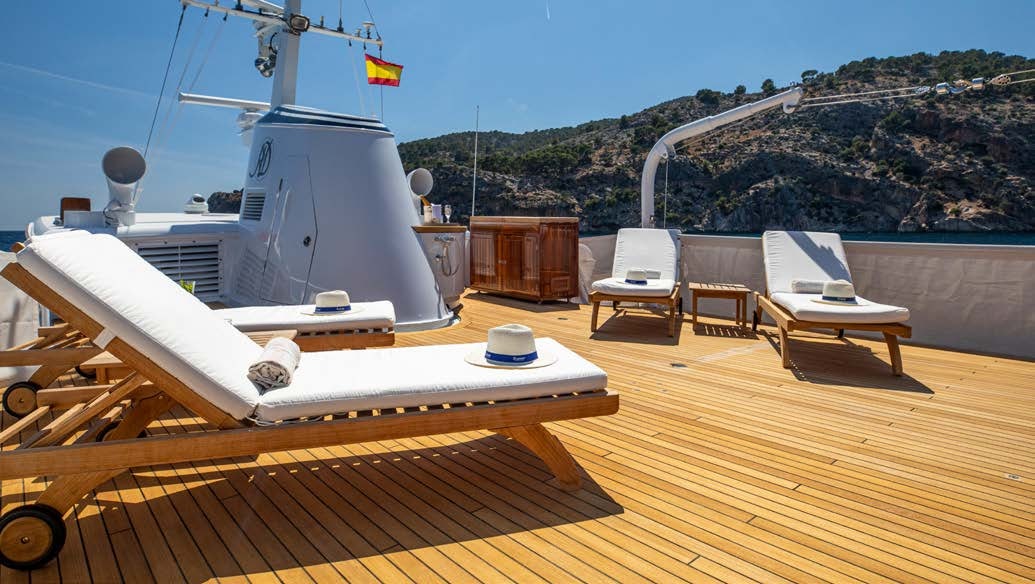 a boat on a deck aboard HEAVENLY DAZE Yacht for Charter