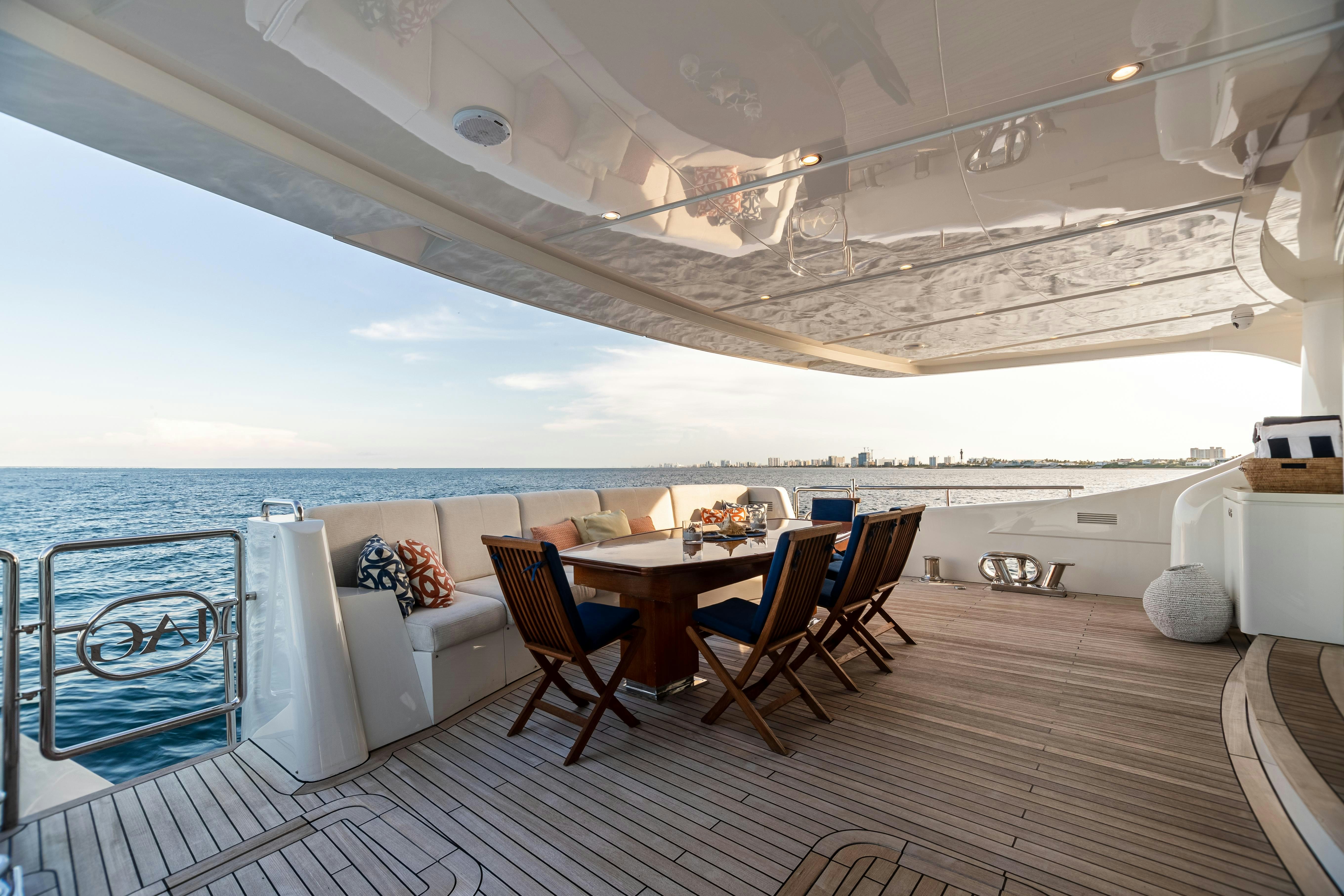 a room with a table and chairs aboard SWEET CAROLINE Yacht for Charter