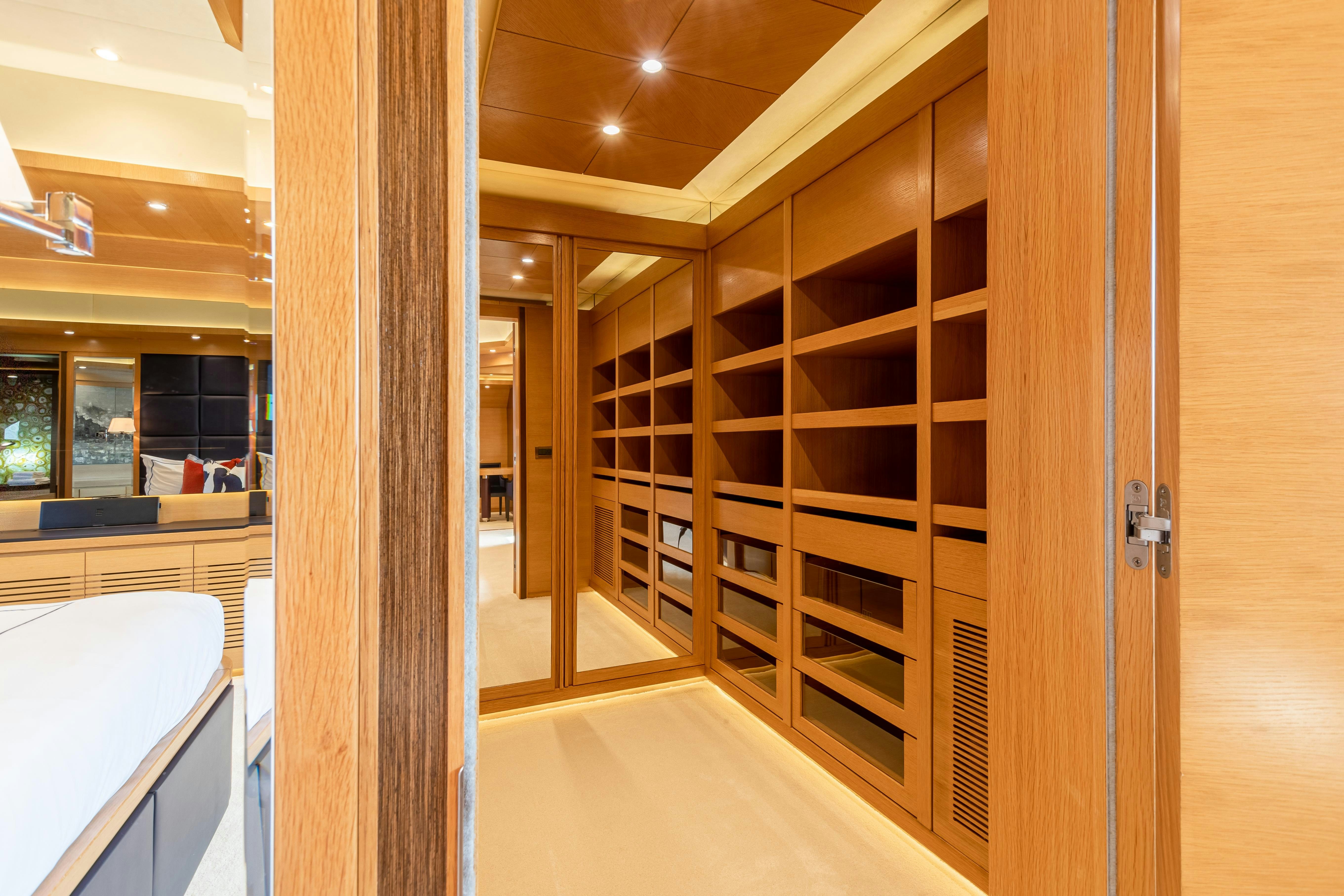 a room with a glass door aboard SWEET CAROLINE Yacht for Charter