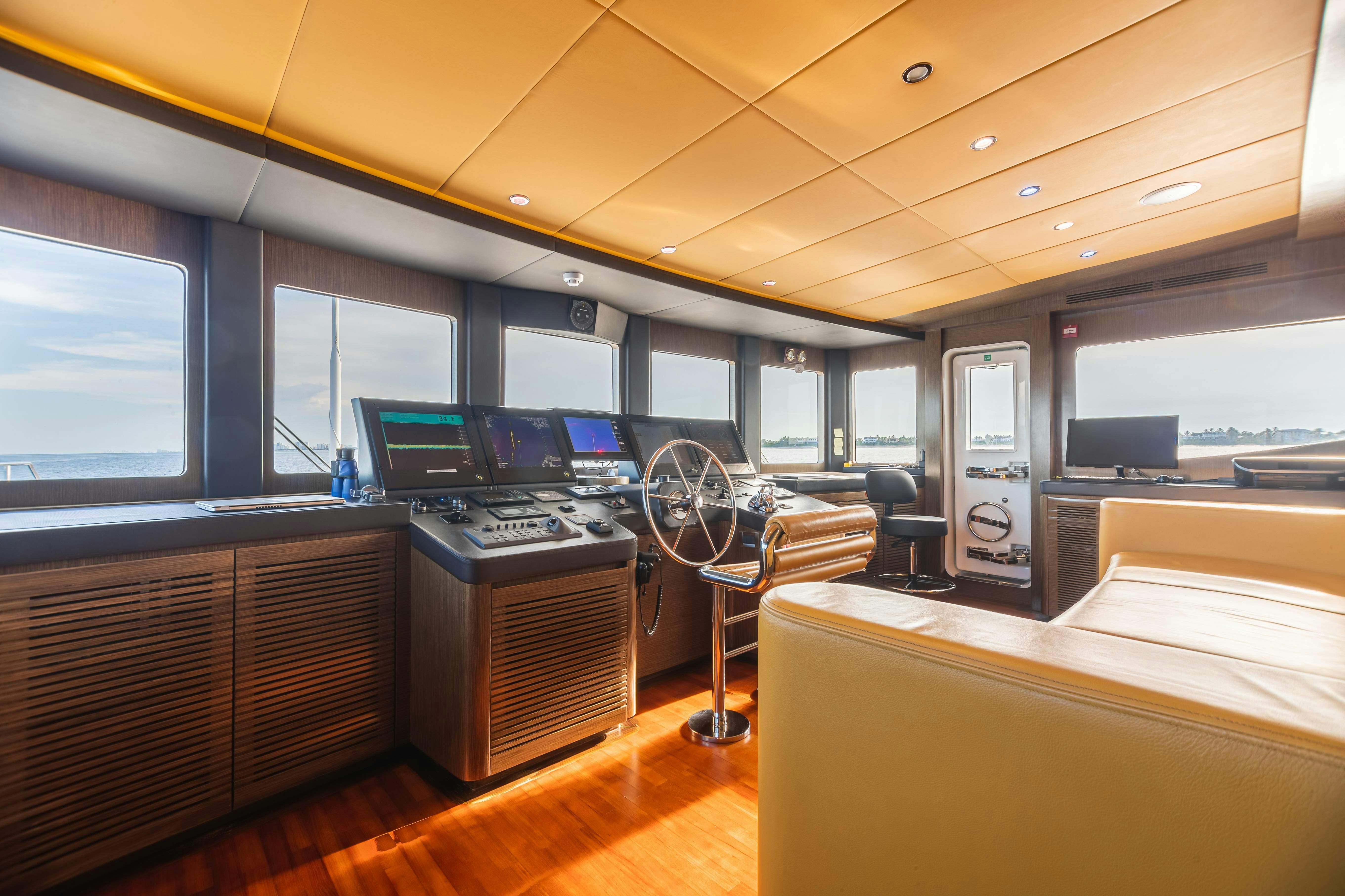 a room with computers and monitors aboard SWEET CAROLINE Yacht for Charter