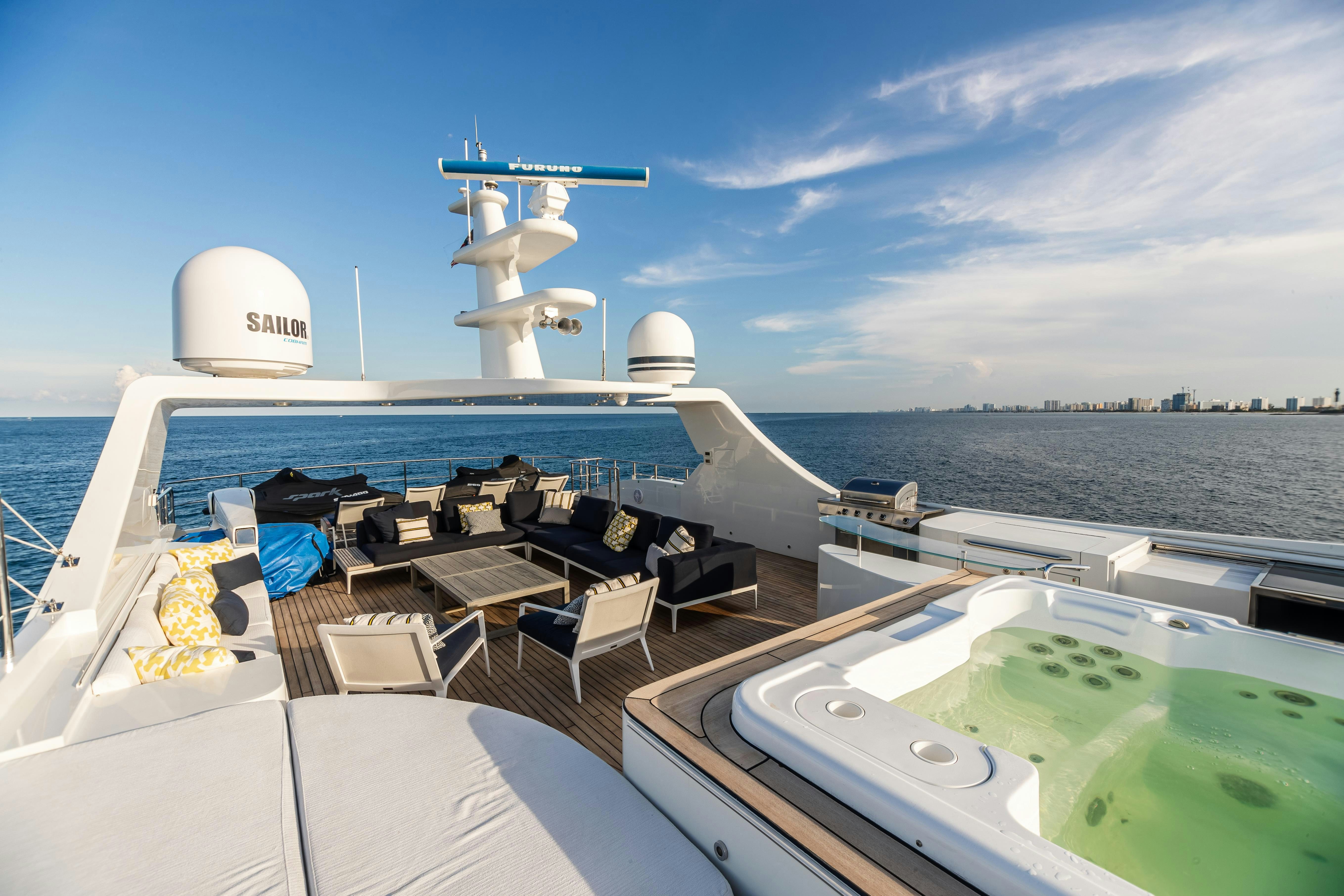 a boat with a satellite dish on the deck aboard SWEET CAROLINE Yacht for Charter