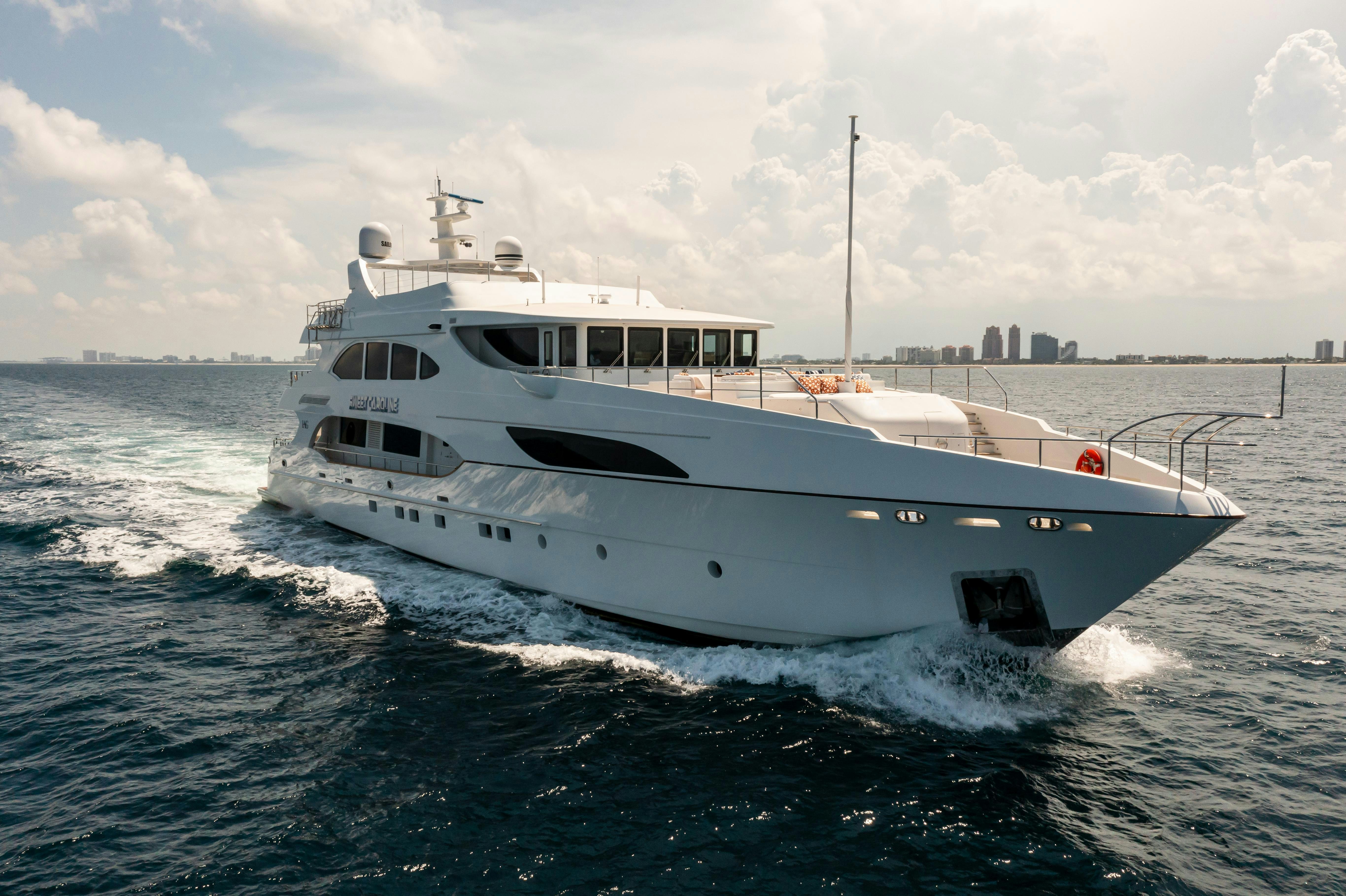 a white boat on the water aboard SWEET CAROLINE Yacht for Charter