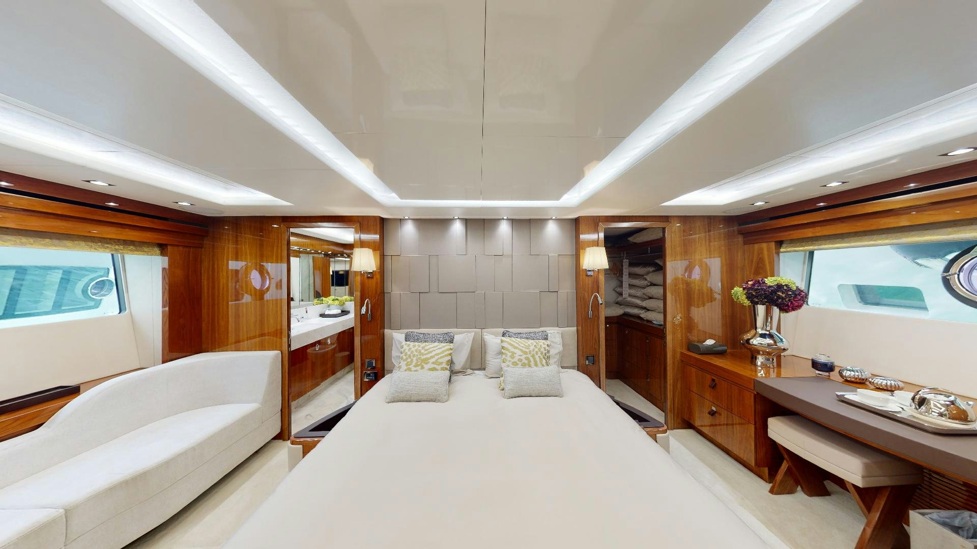 a room with a bed and a table aboard A & K Yacht for Sale