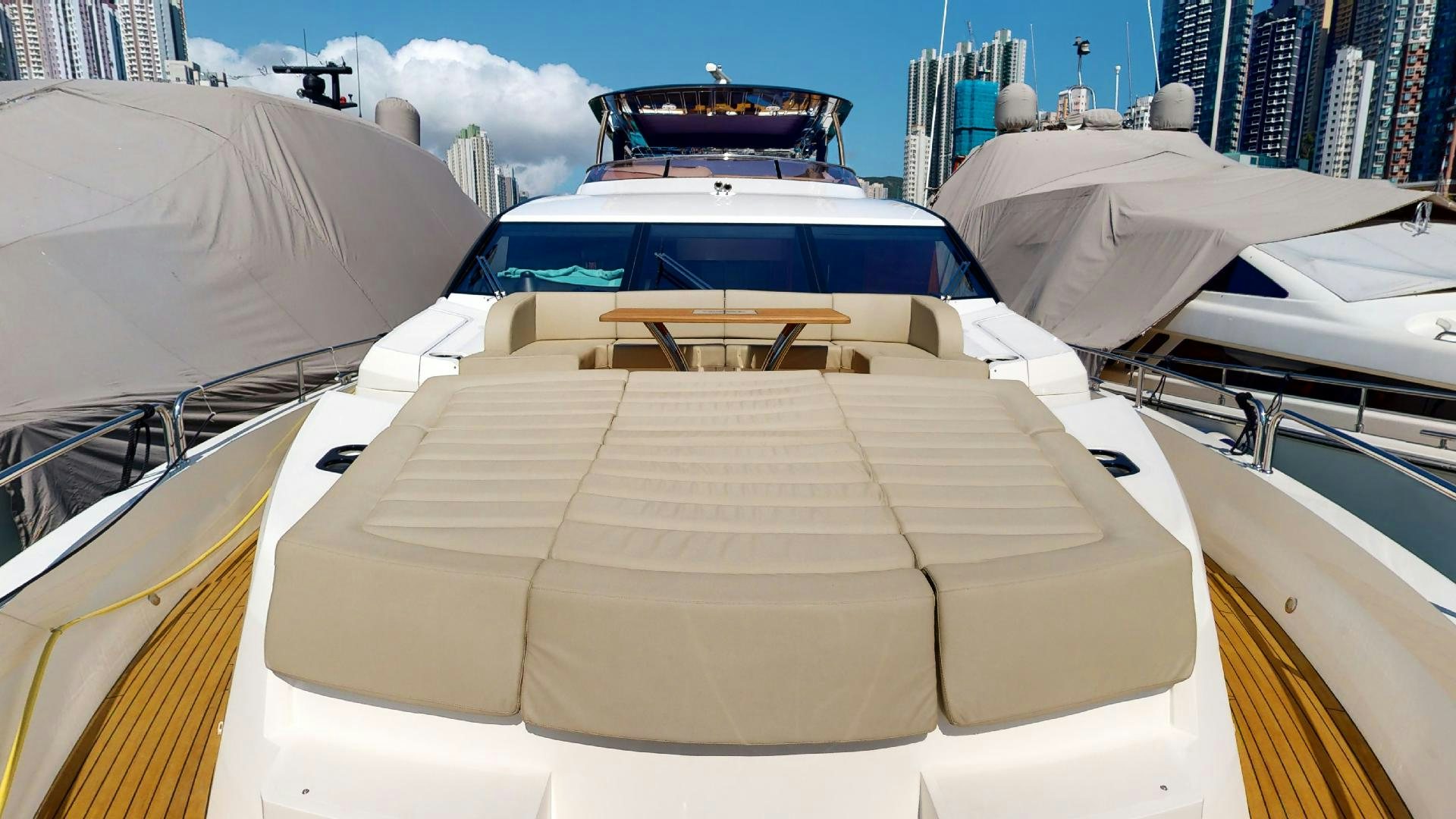 a boat with a white cover aboard A & K Yacht for Sale