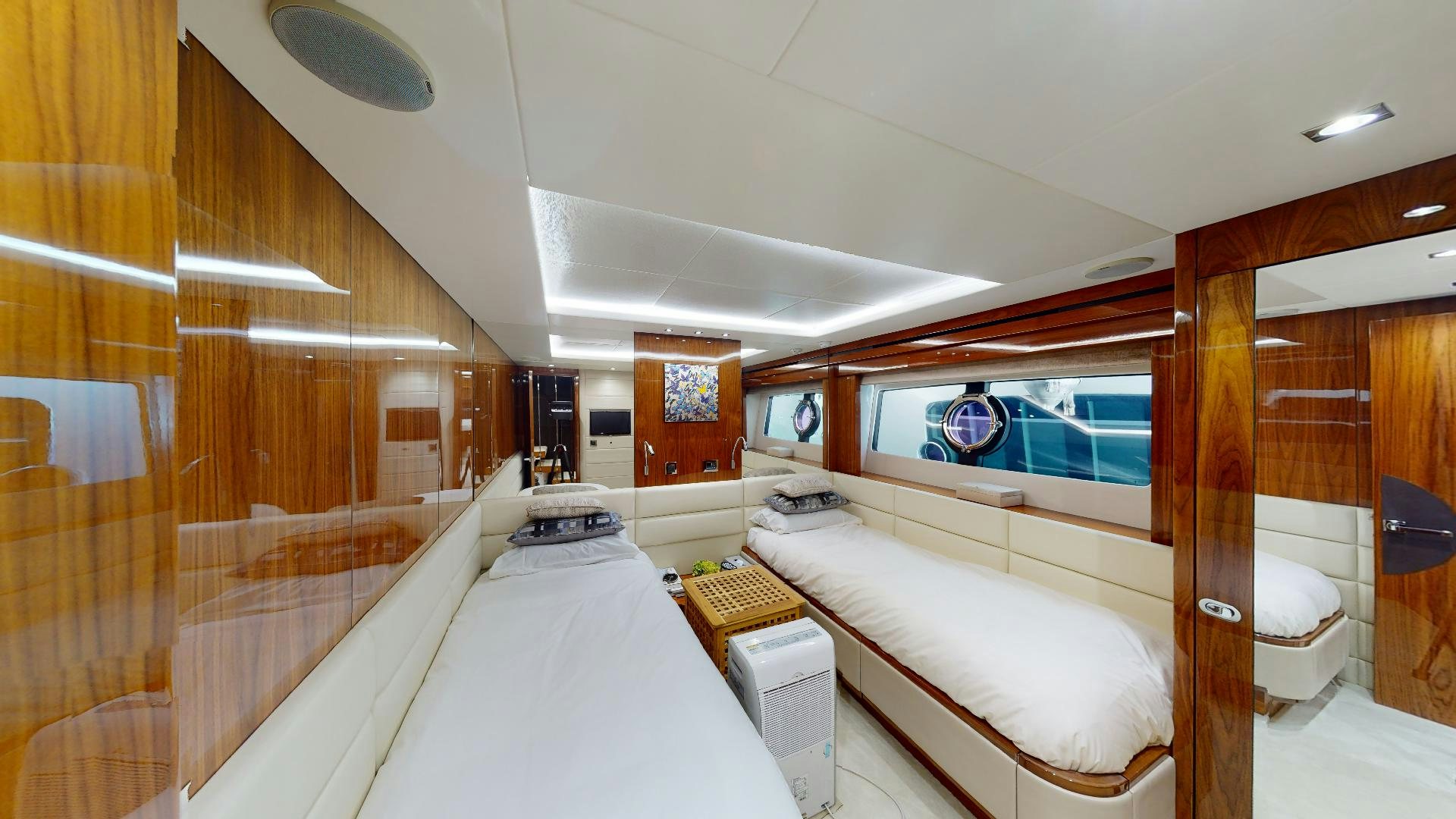 a room with a bed and a window aboard A & K Yacht for Sale